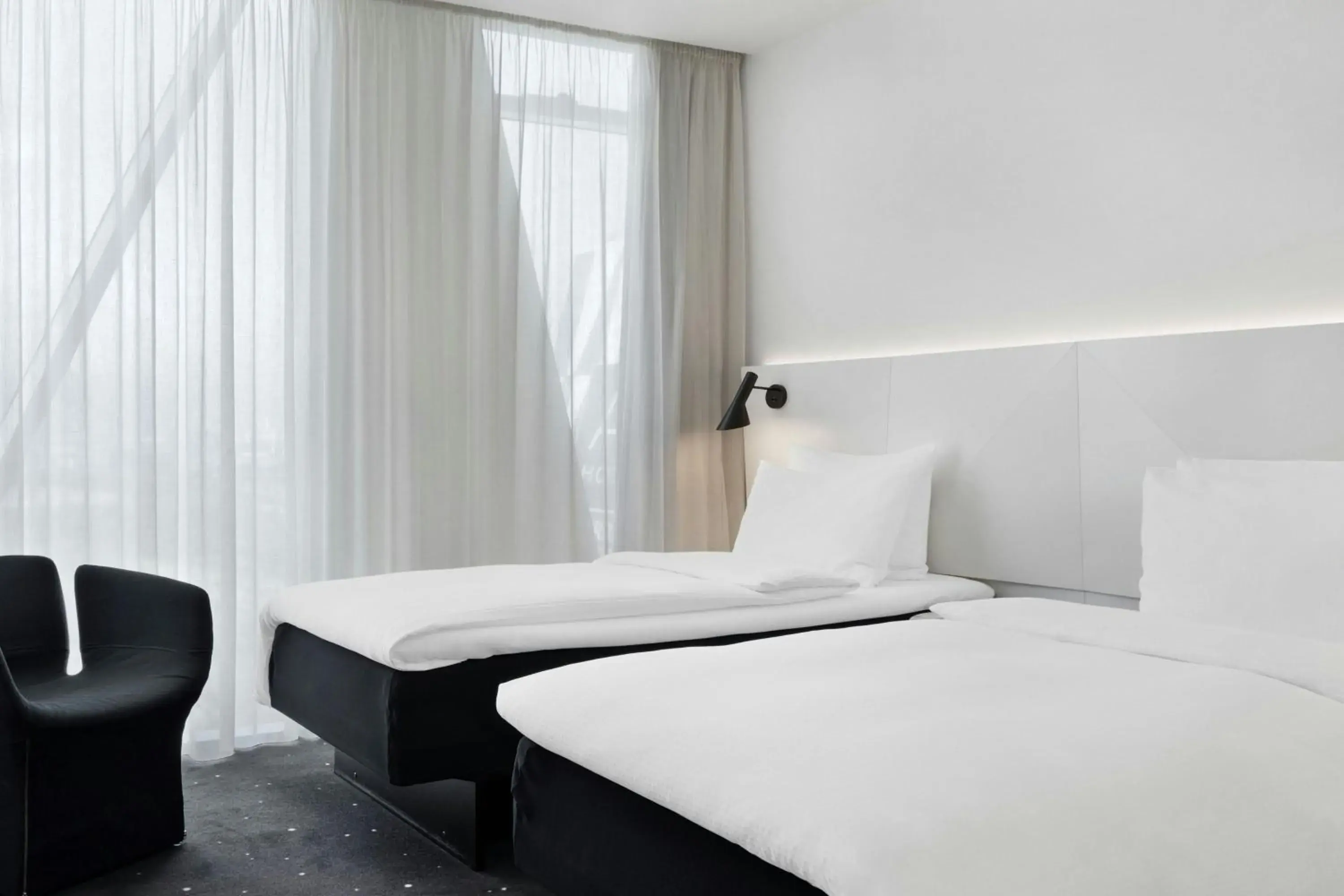 Deluxe Guest Room With Twin Beds in AC Hotel by Marriott Bella Sky Copenhagen Deluxe Guest Room With Twin Beds in AC Hotel by Marriott Bella Sky Copenhagen