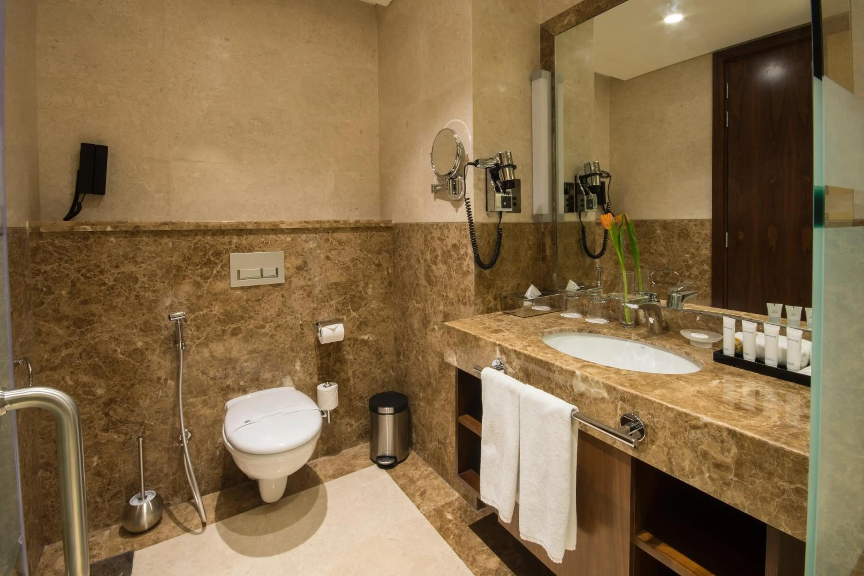 Toilet in Golden Tulip Media Hotel