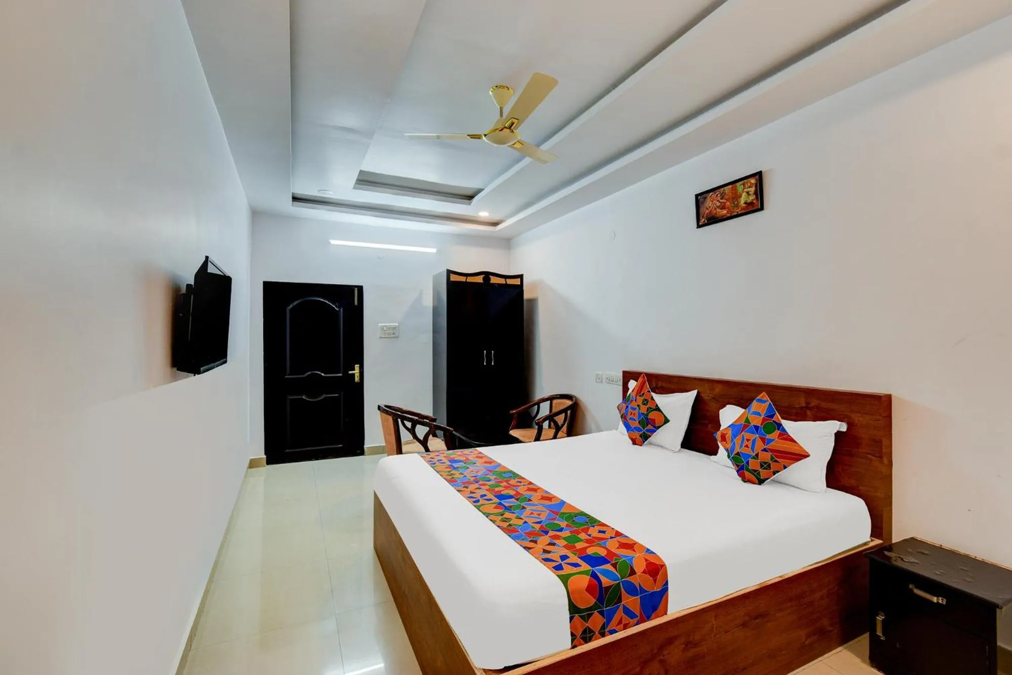 Bed in FabHotel Pushpa Grand