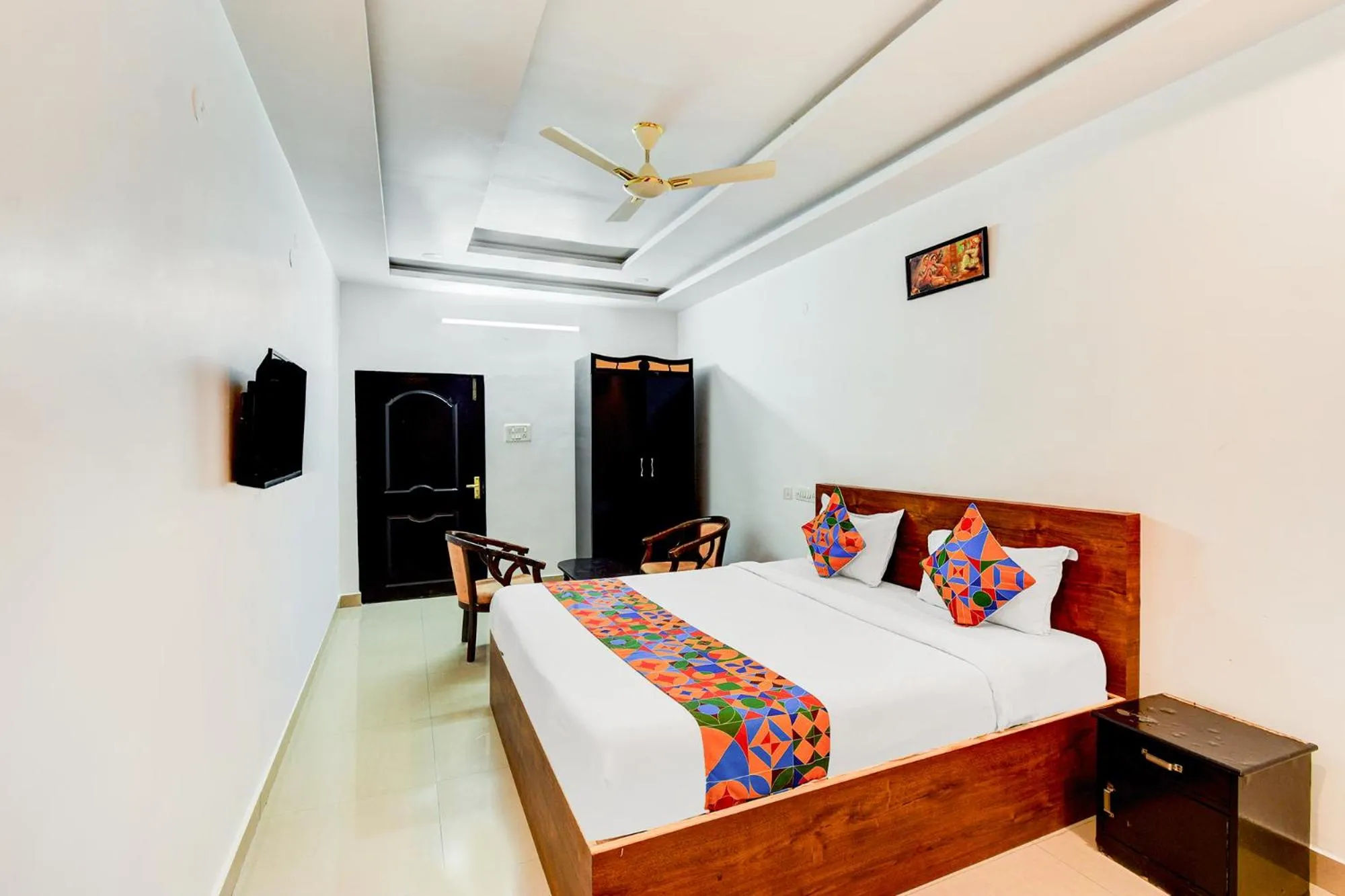Bed in FabHotel Pushpa Grand