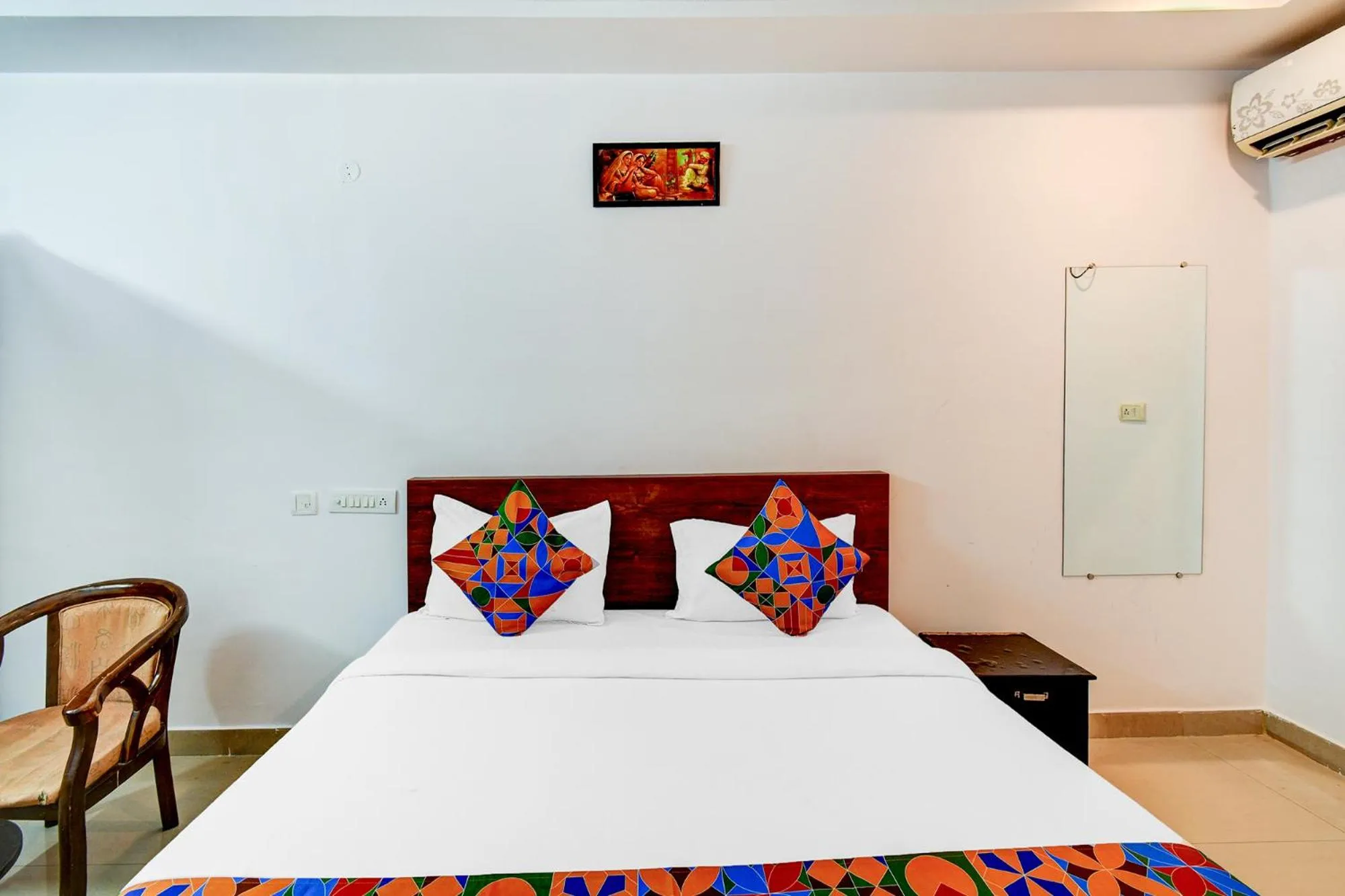 Bed in FabHotel Pushpa Grand
