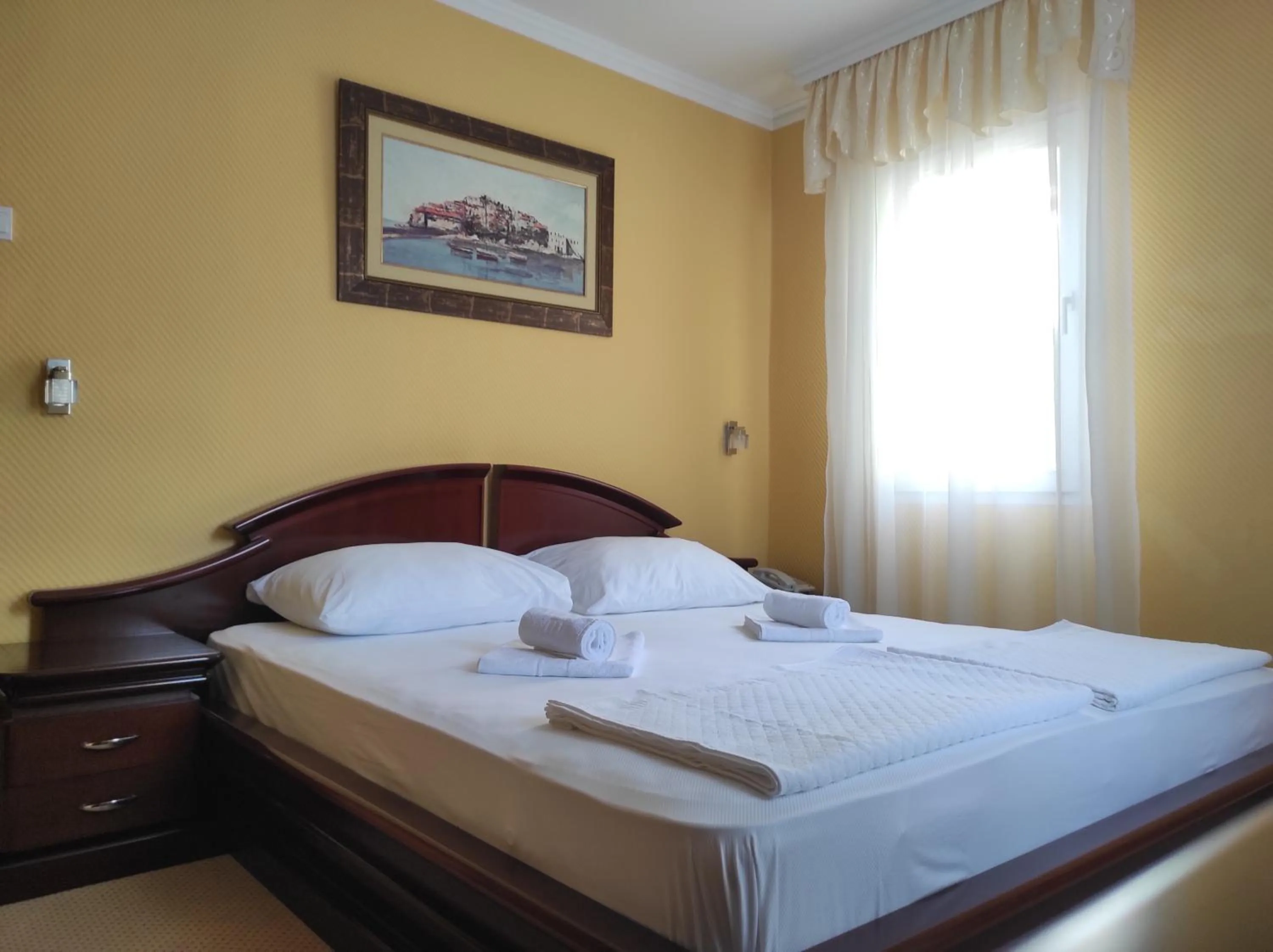 Bed in Hotel Mimoza