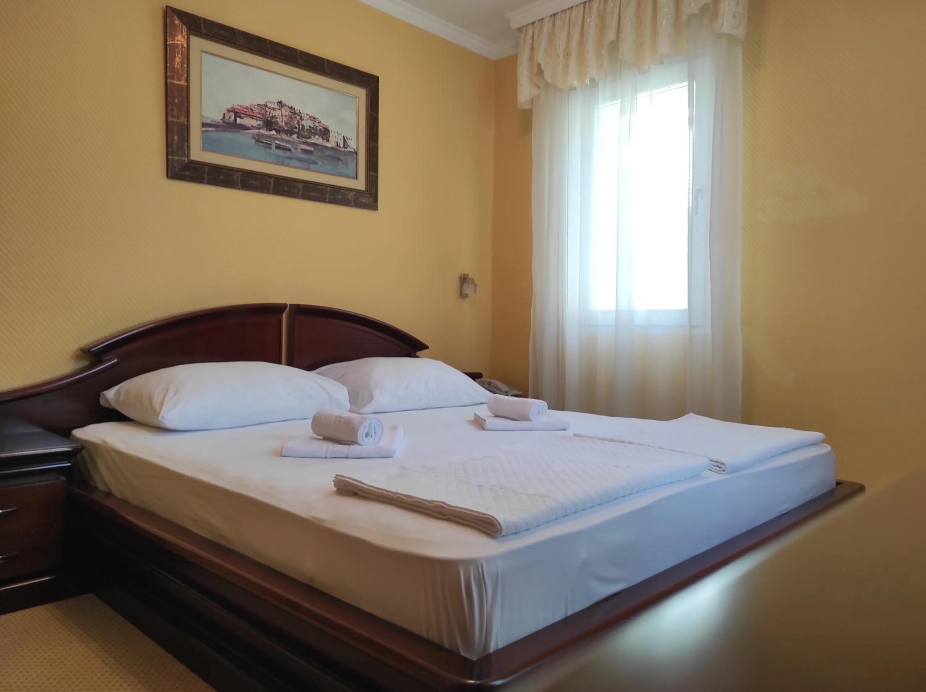 Bed in Hotel Mimoza