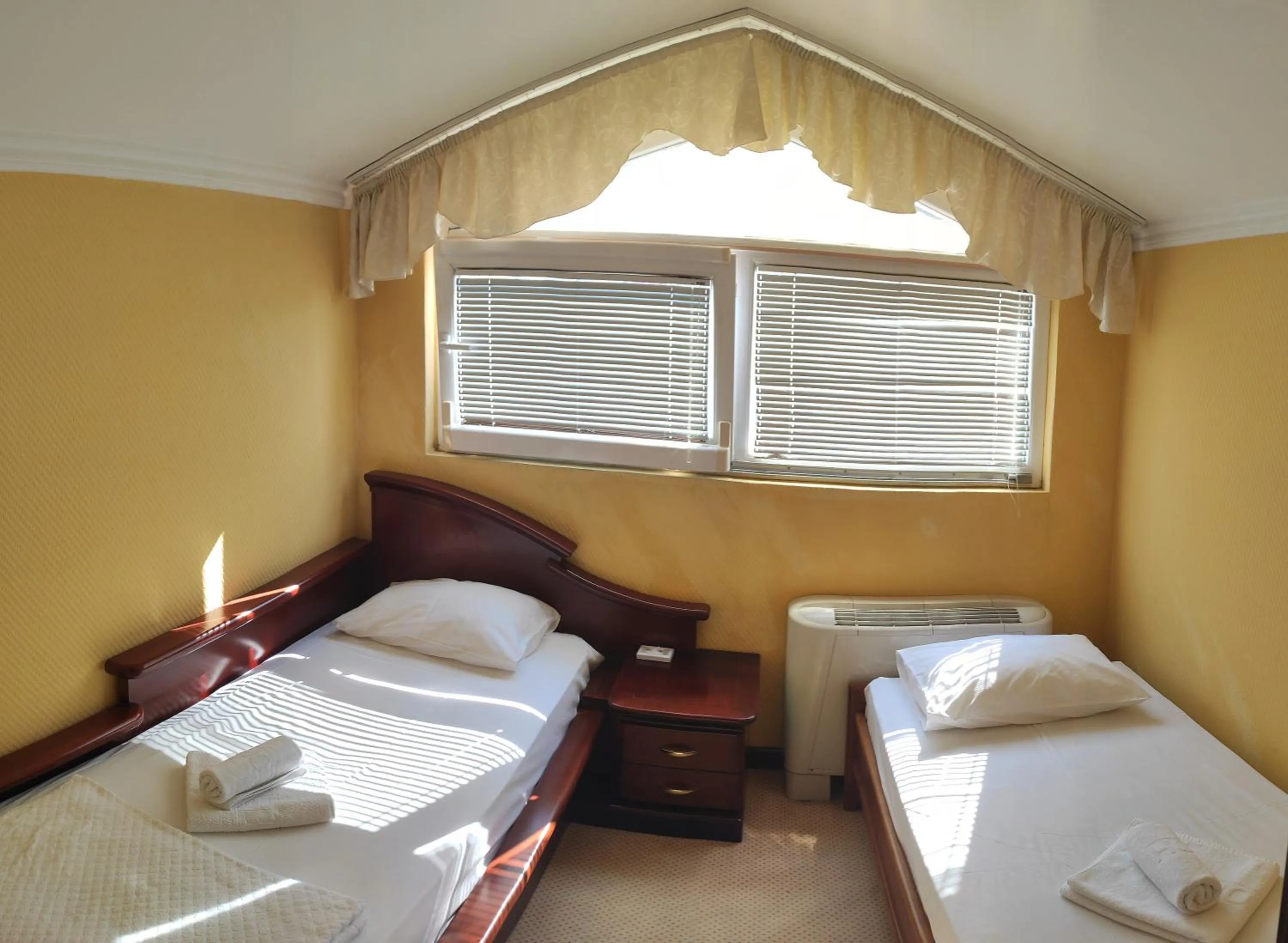 Bed in Hotel Mimoza