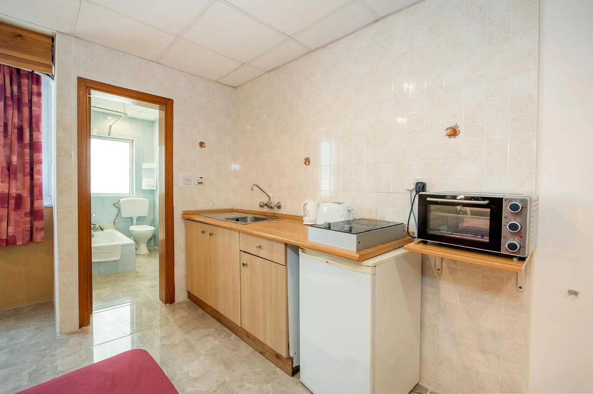 Kitchen or kitchenette in Alborada Apart Hotel