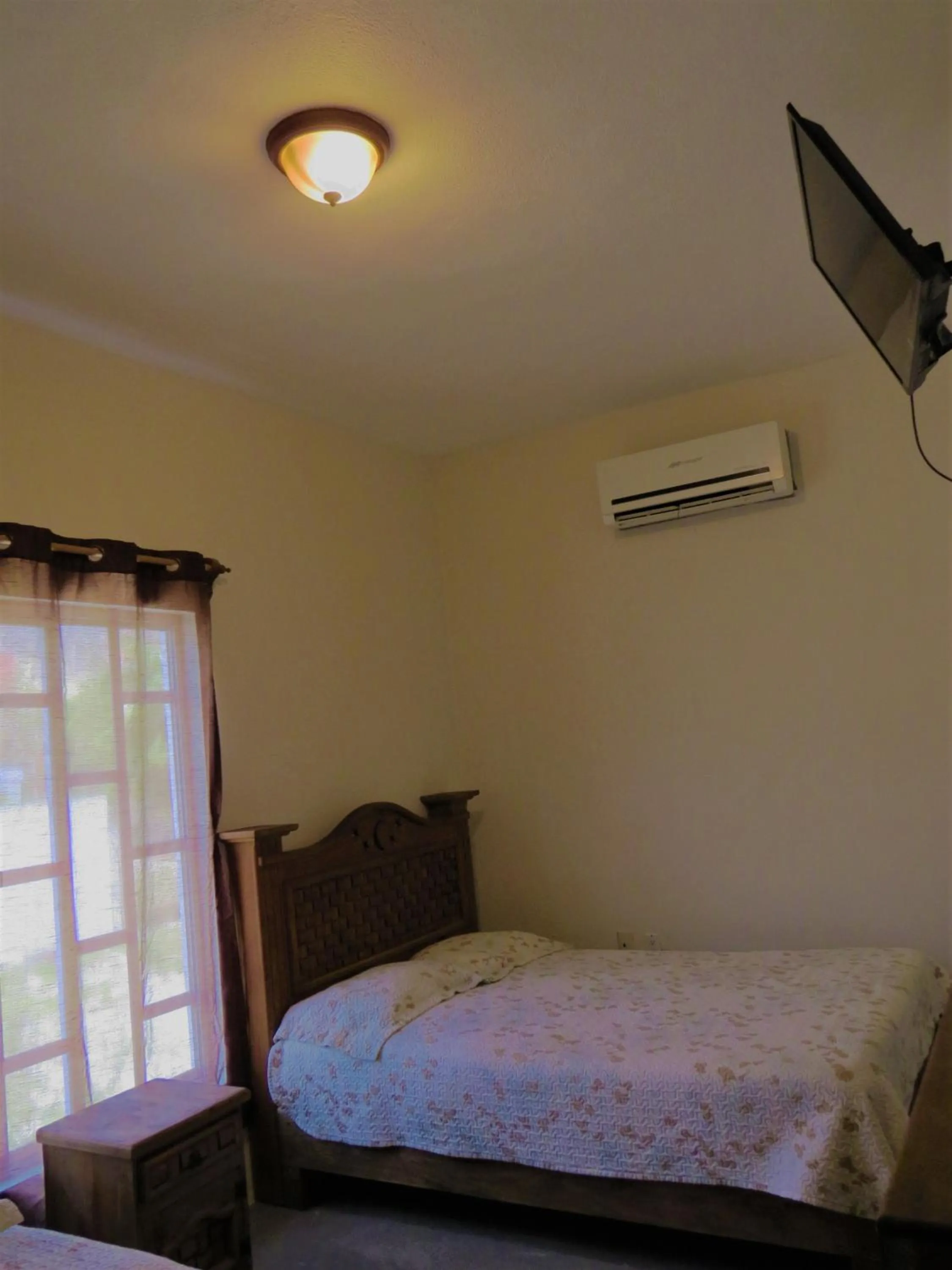 Bed in Hotel Purisima Concepción