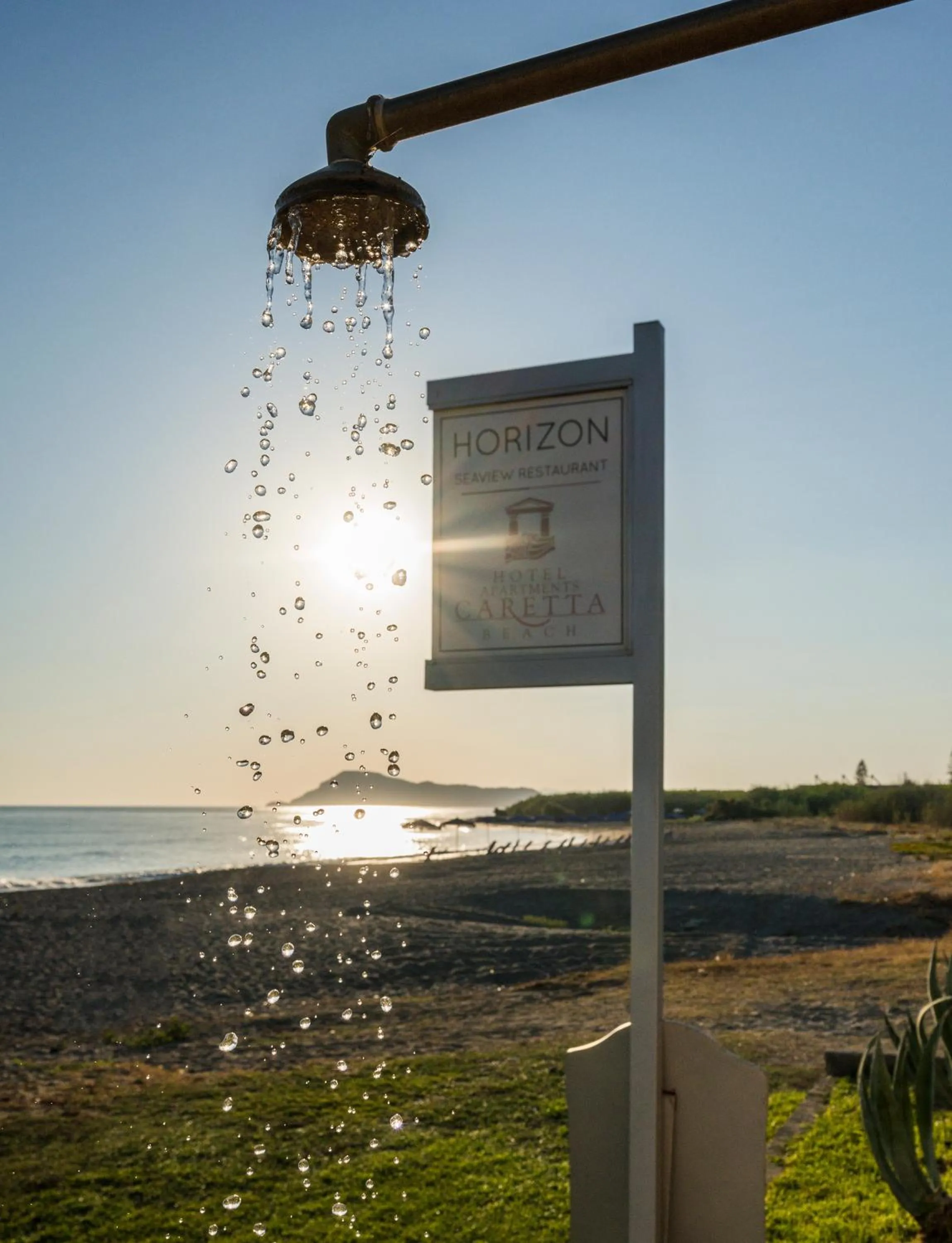 Property logo or sign in Hotel Caretta Beach