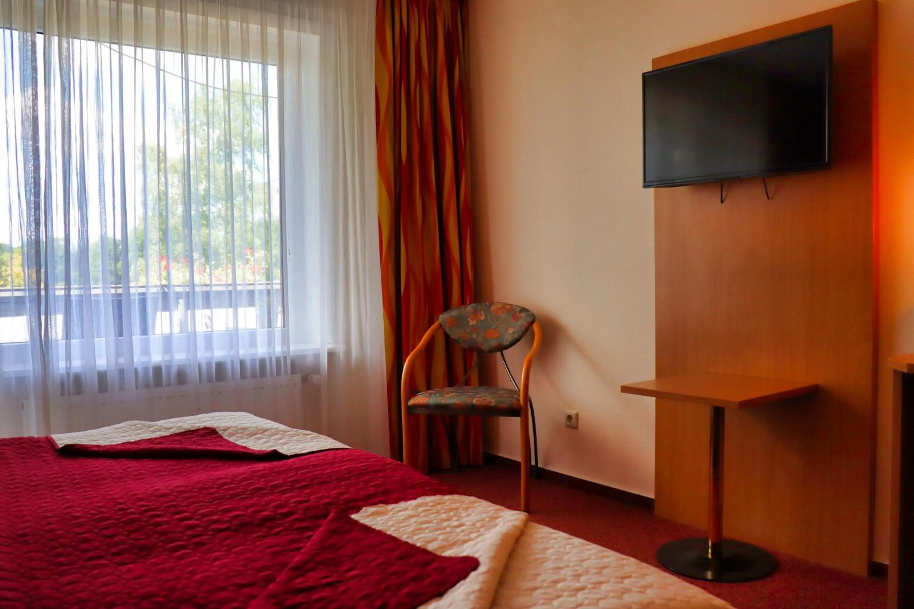 Photo of the whole room, Bed in Landgasthof Allerparadies