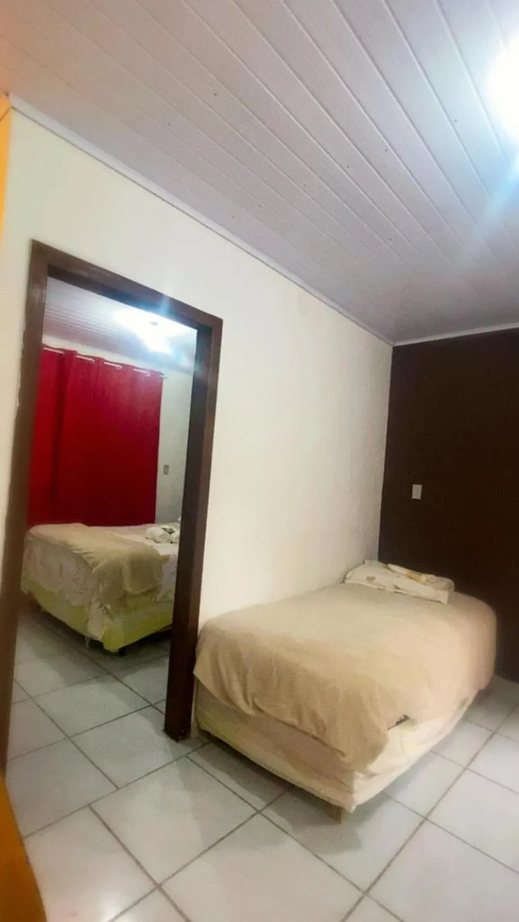 Bed in Pousada da Heloisa