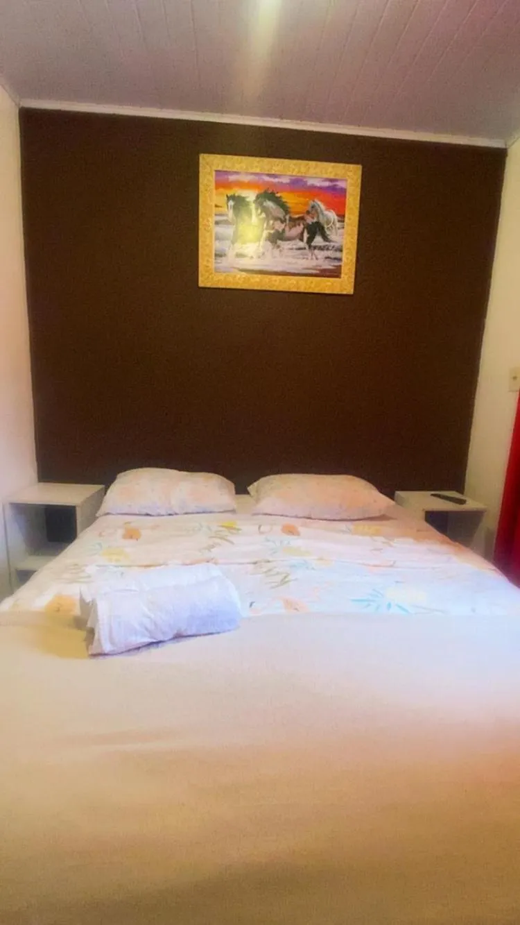 Bed in Pousada da Heloisa