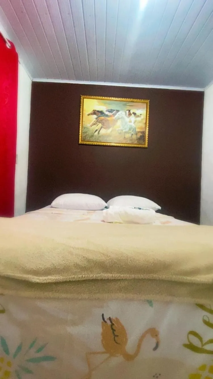 Bed in Pousada da Heloisa