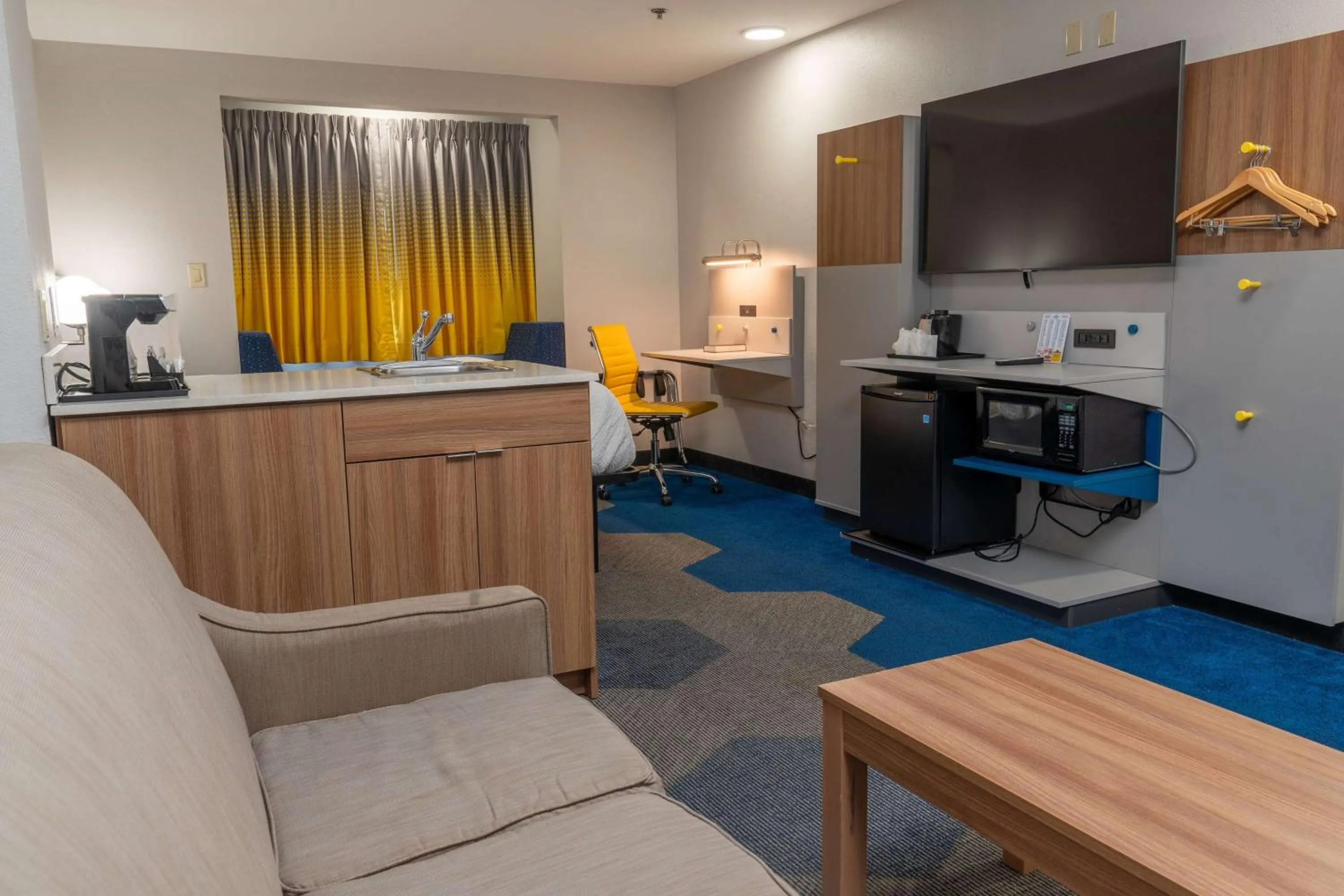 Bed in Microtel Inn & Suites by Wyndham Pigeon Forge