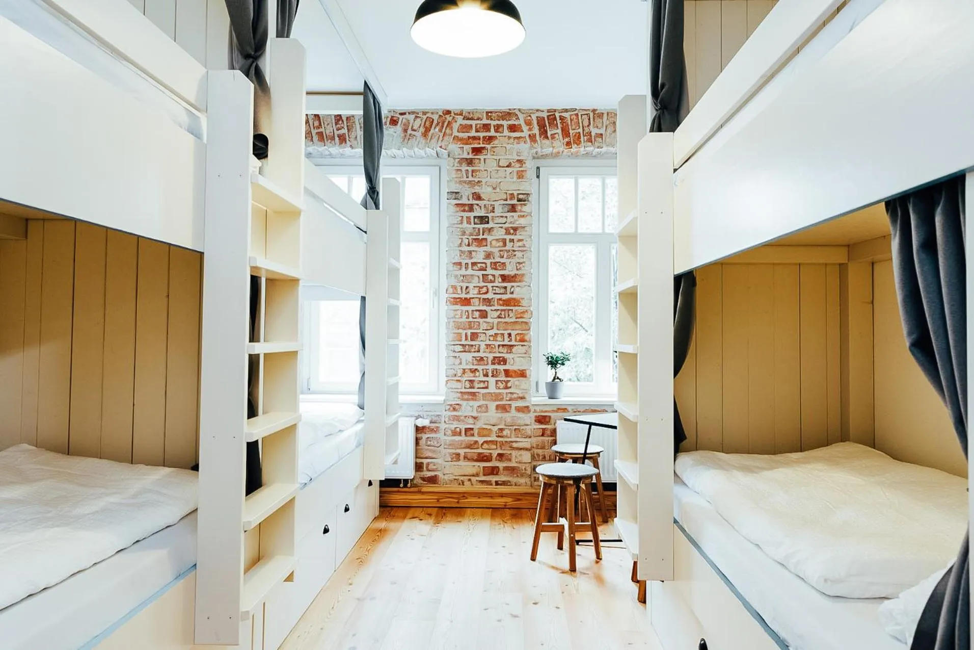 Seating area, Bed in Hostel Multitude