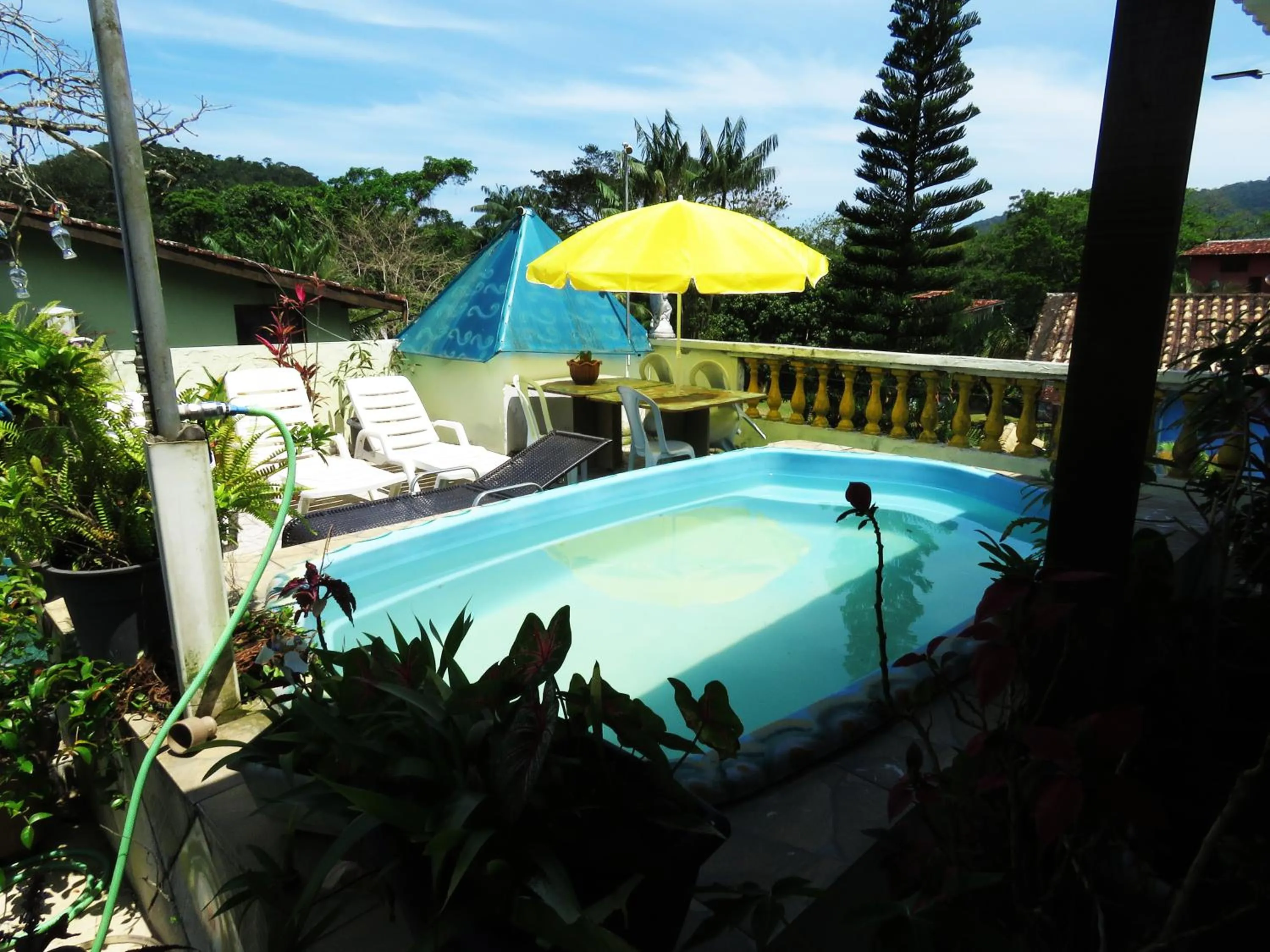 Swimming pool in Pousada Solstício De Verão