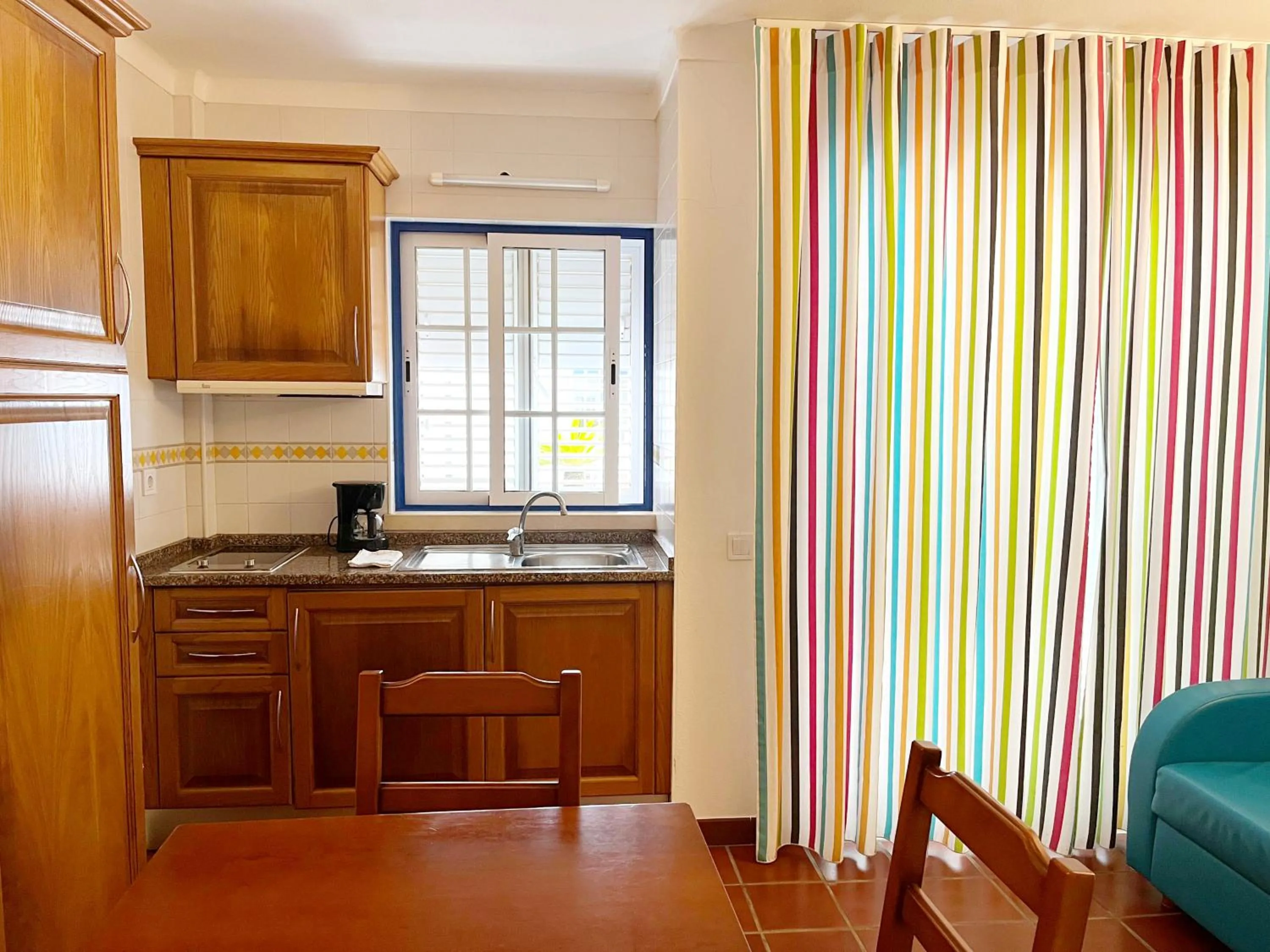 Kitchen or kitchenette in Patios da Vila - Duna Parque Resorts & Hotels