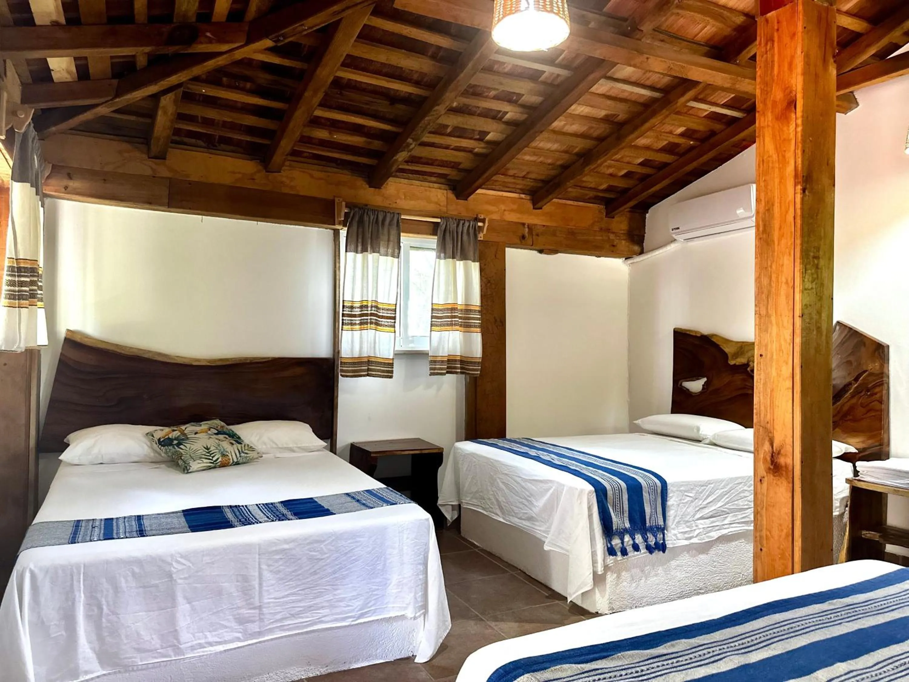 Bed in Casa Paraiso Hotel Boutique