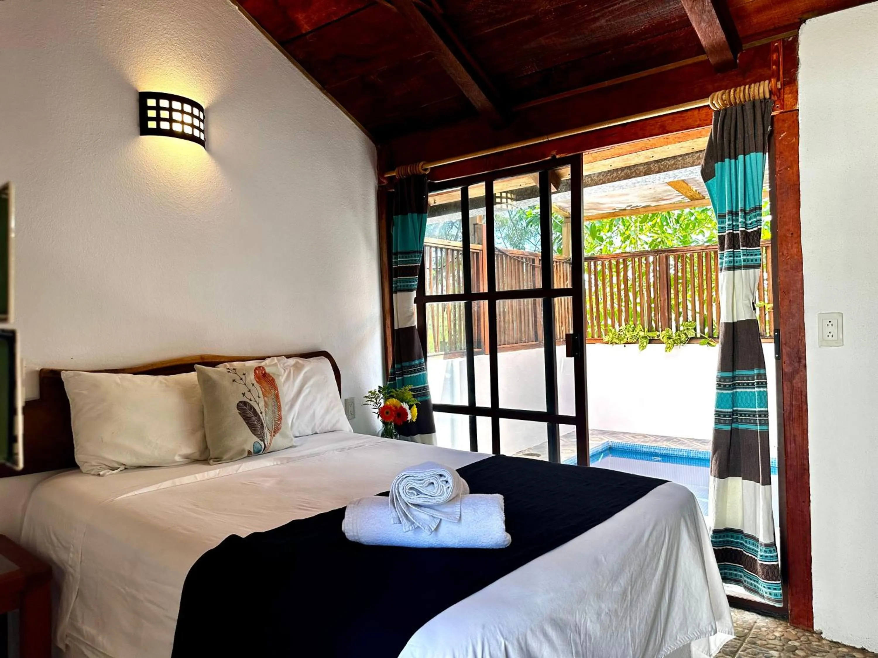 Bed in Casa Paraiso Hotel Boutique