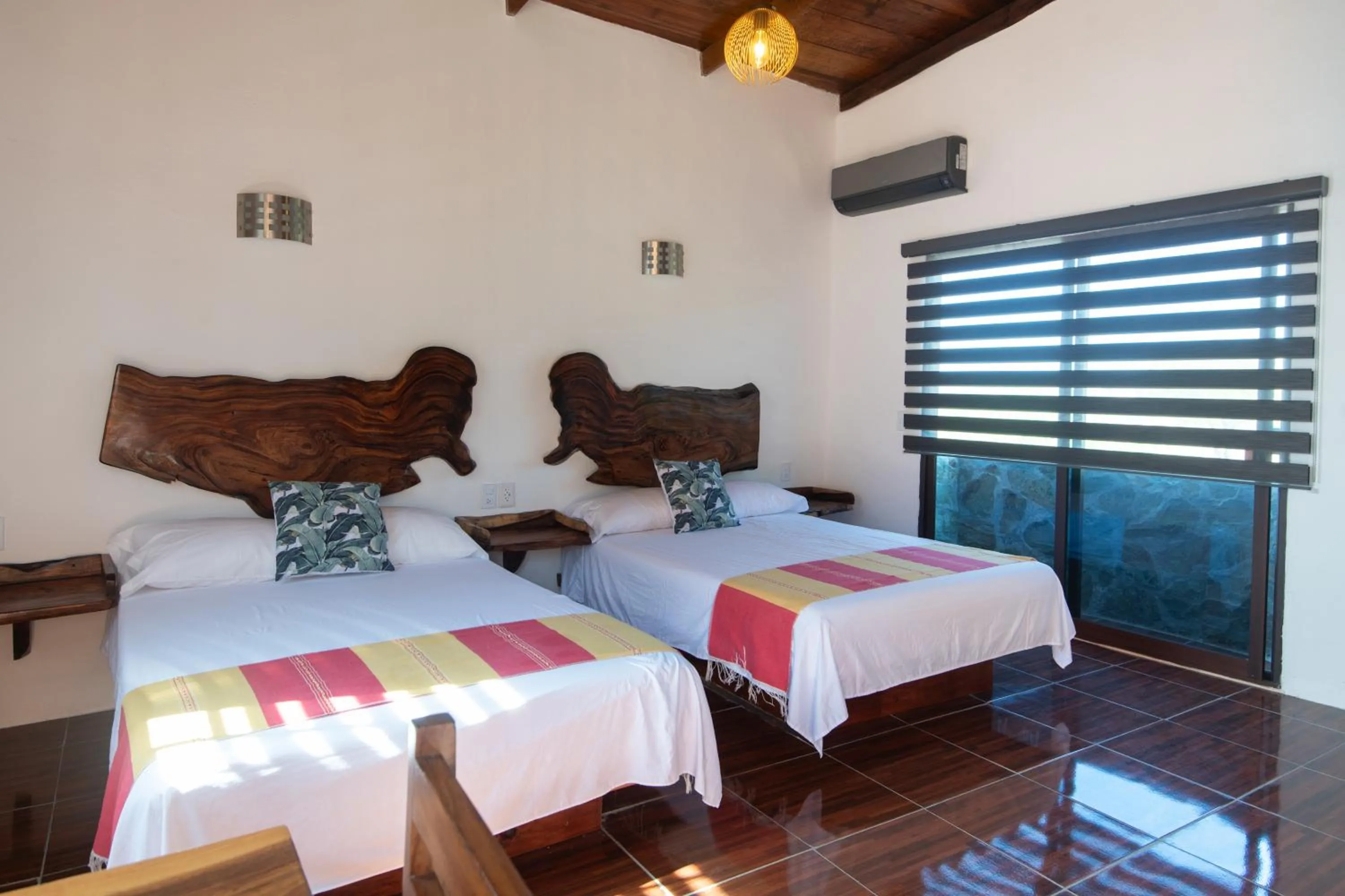 Bed in Casa Paraiso Hotel Boutique
