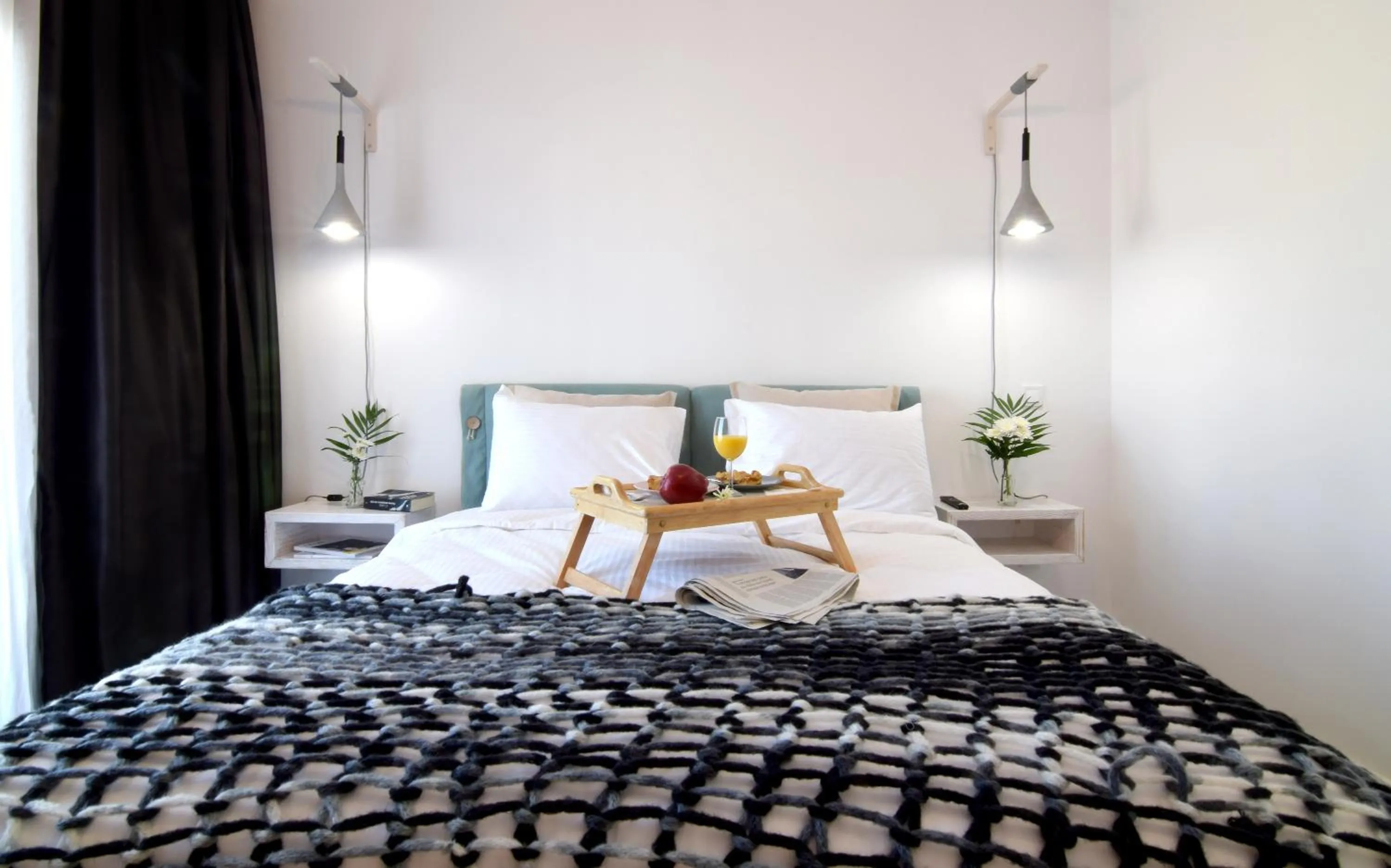 Bed in Grey Studios by Skg Apartments