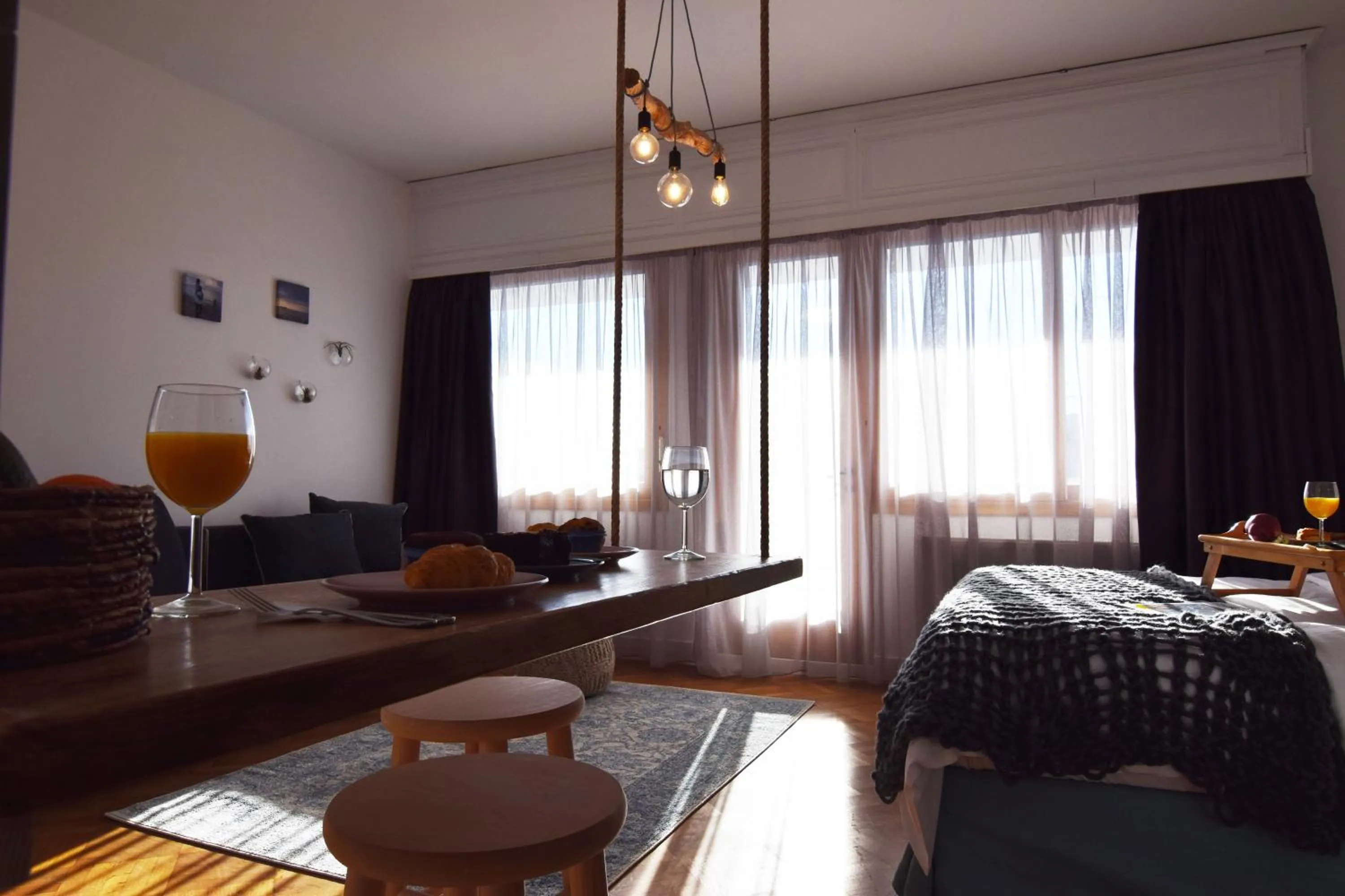 Bed in Grey Studios by Skg Apartments