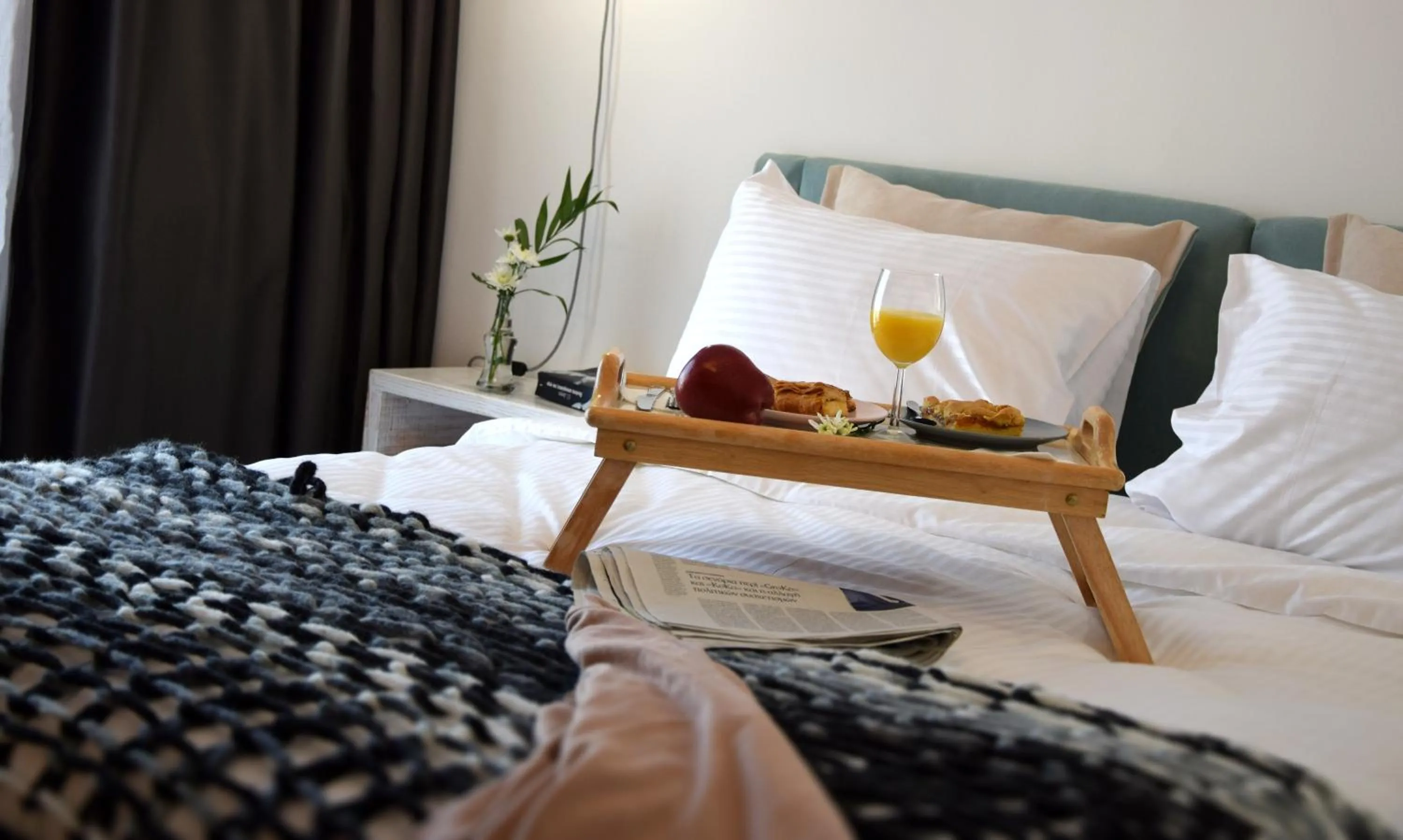 Bed in Grey Studios by Skg Apartments