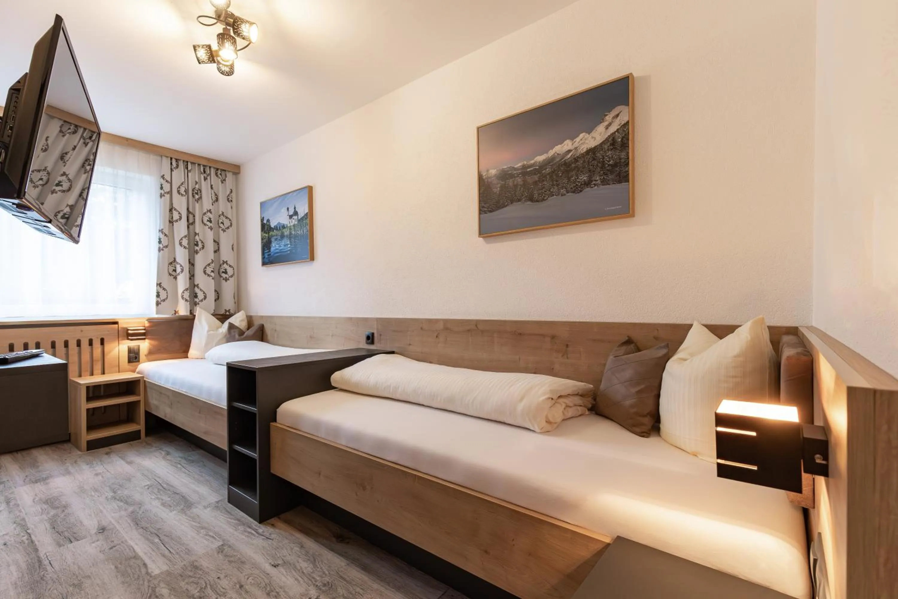 Bed in Das Aparthotel Olympia Tirol