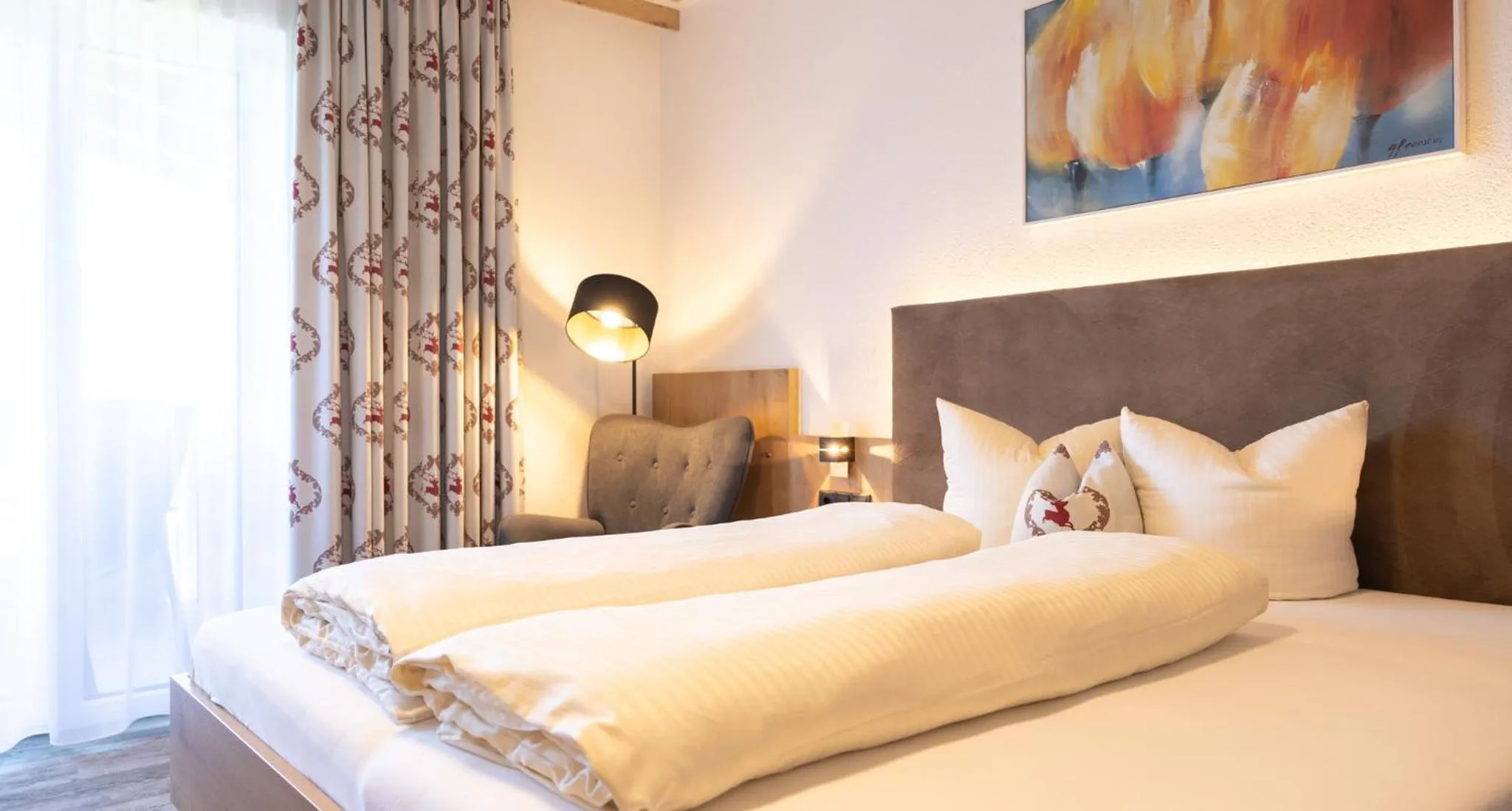 Bed in Das Aparthotel Olympia Tirol