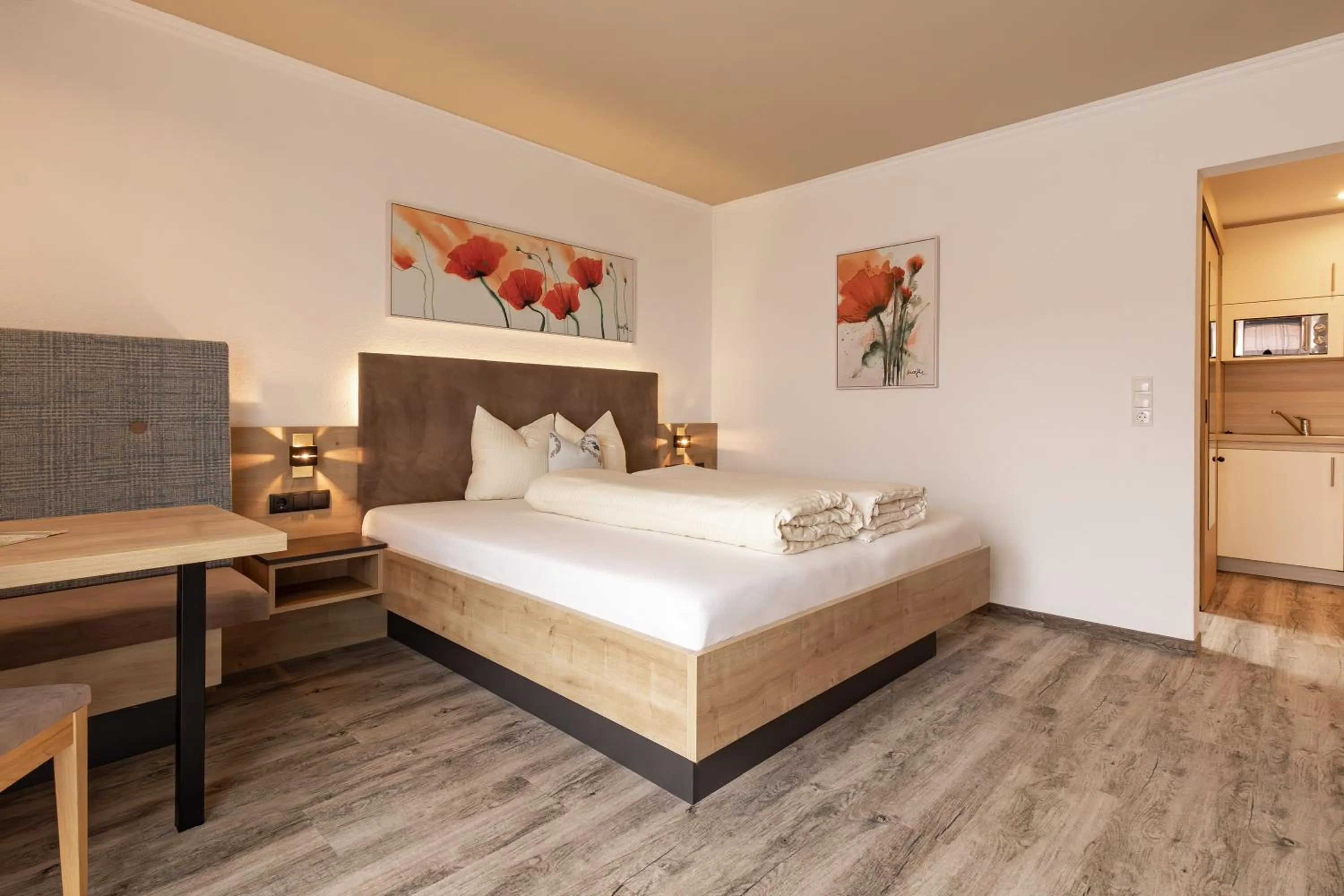 Bed in Das Aparthotel Olympia Tirol