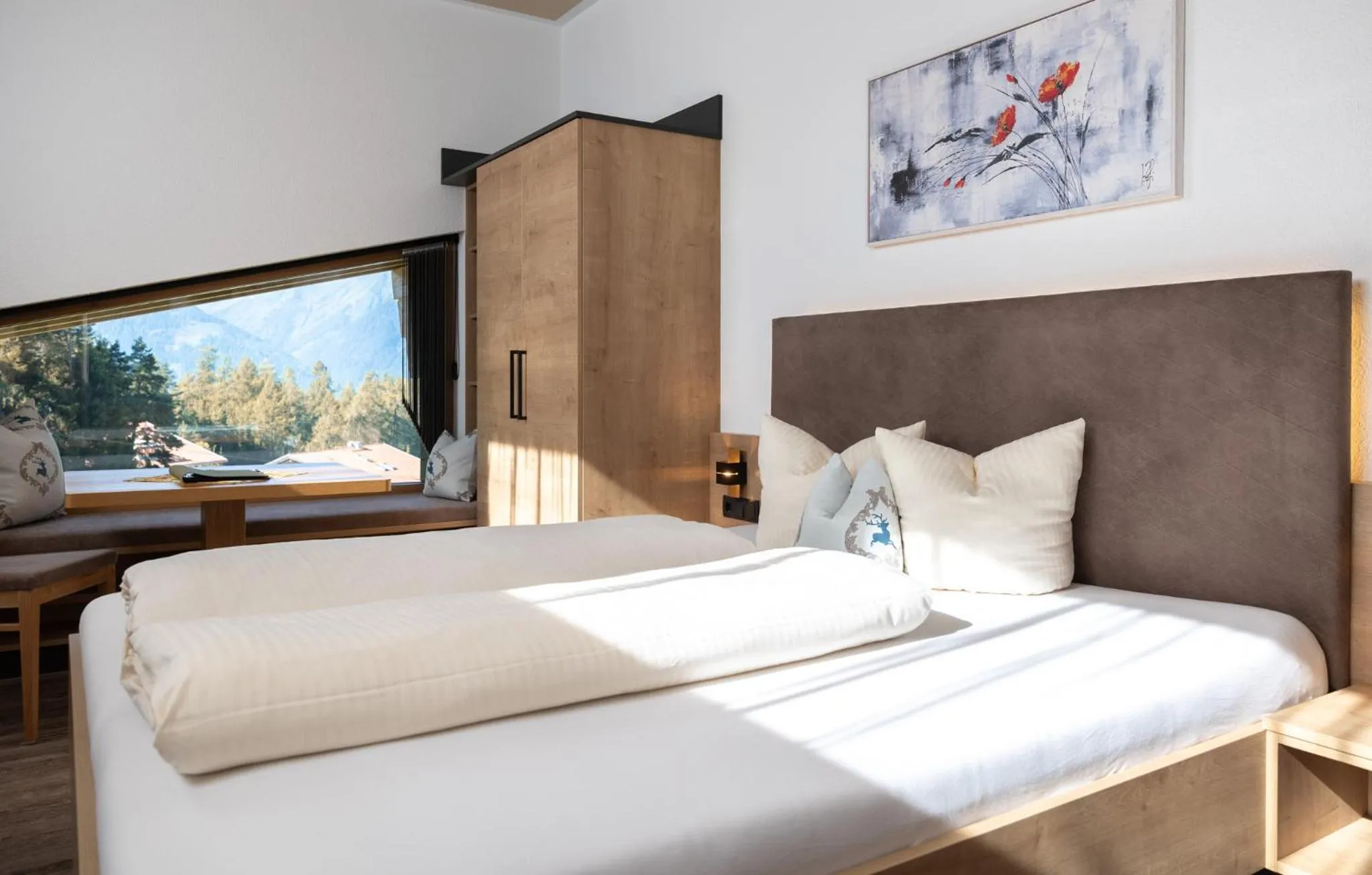 Photo of the whole room, Bed in Das Aparthotel Olympia Tirol