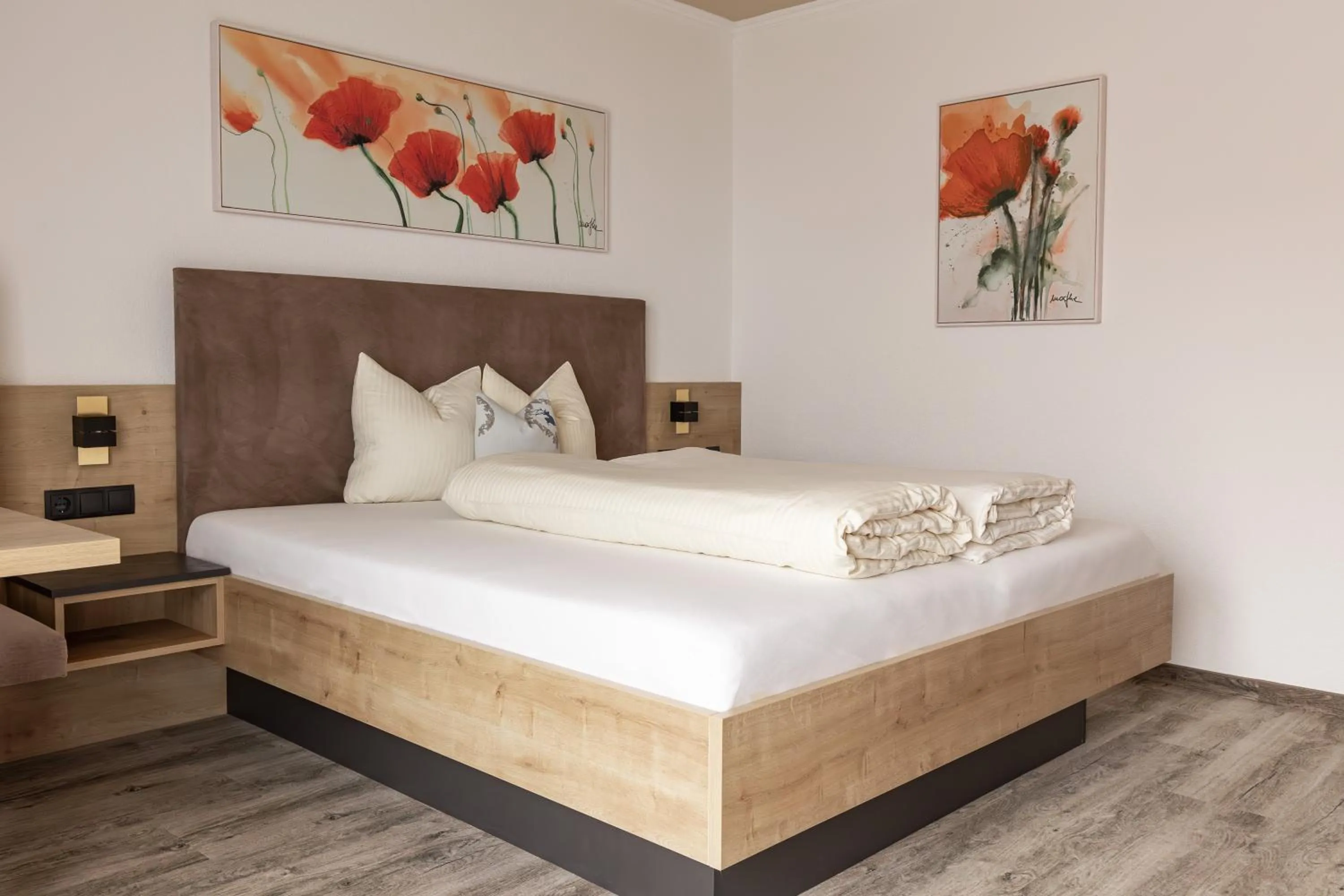 Bed in Das Aparthotel Olympia Tirol