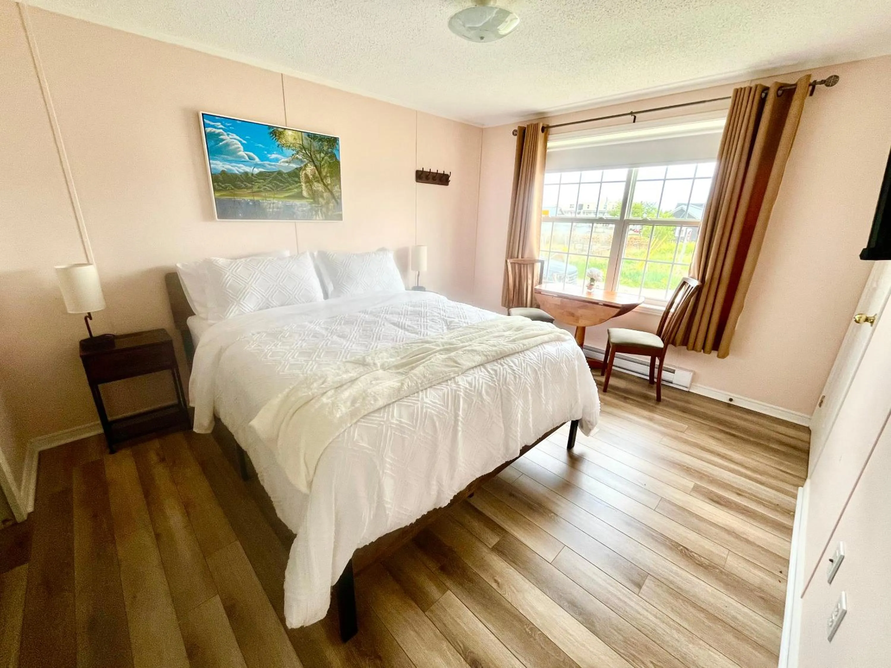 Bed in Alma Shore Lane Suites & Cottages