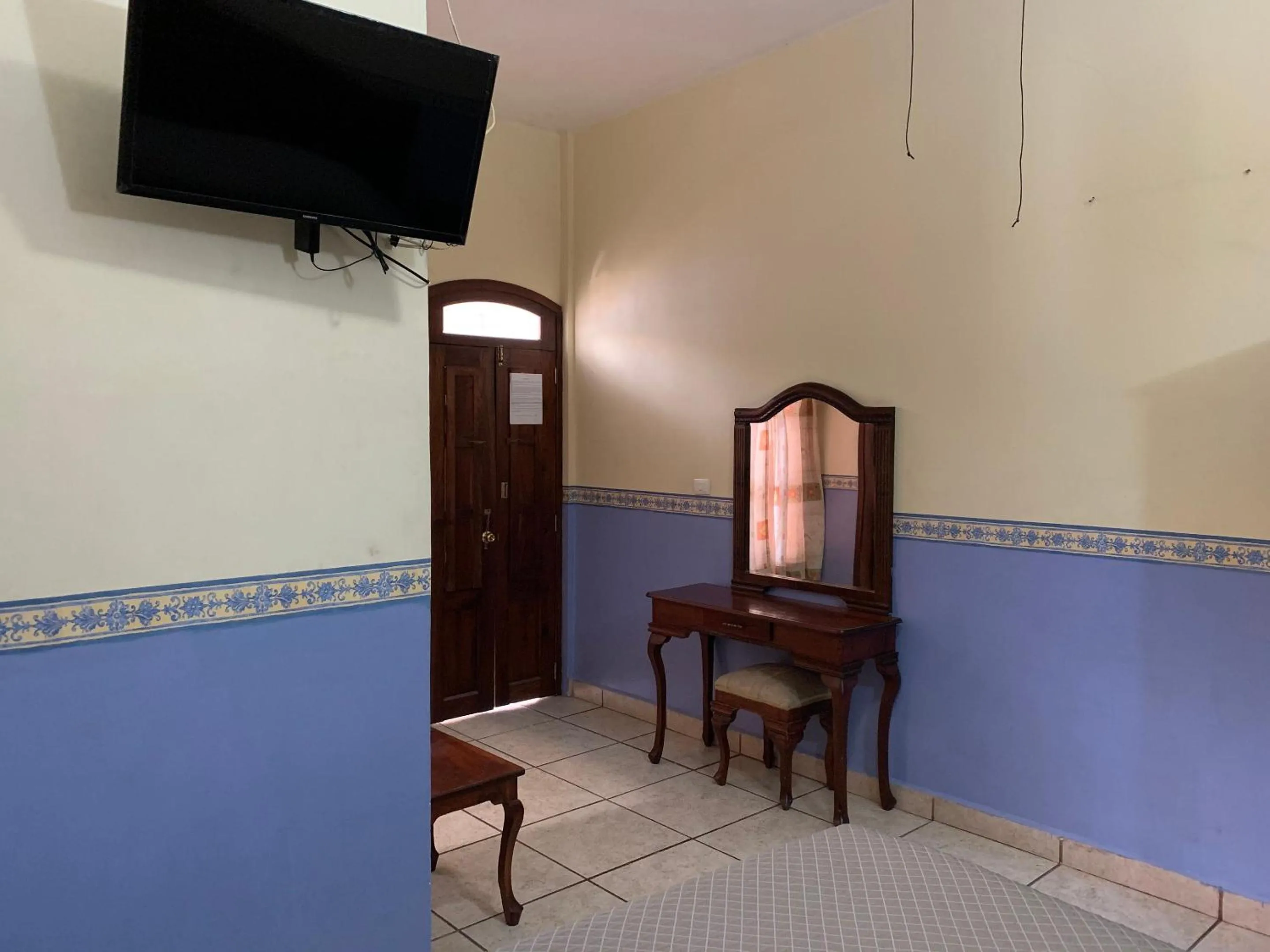 Bedroom in OYO Hotel Real de Cortés