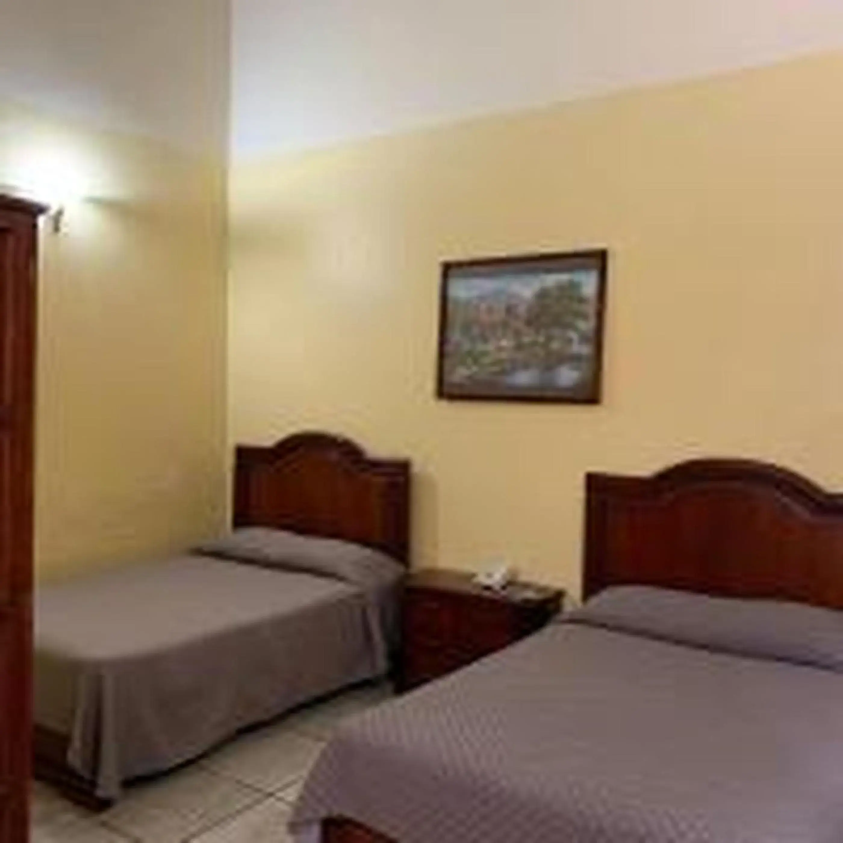 Bed in OYO Hotel Real de Cortés Bed in OYO Hotel Real de Cortés