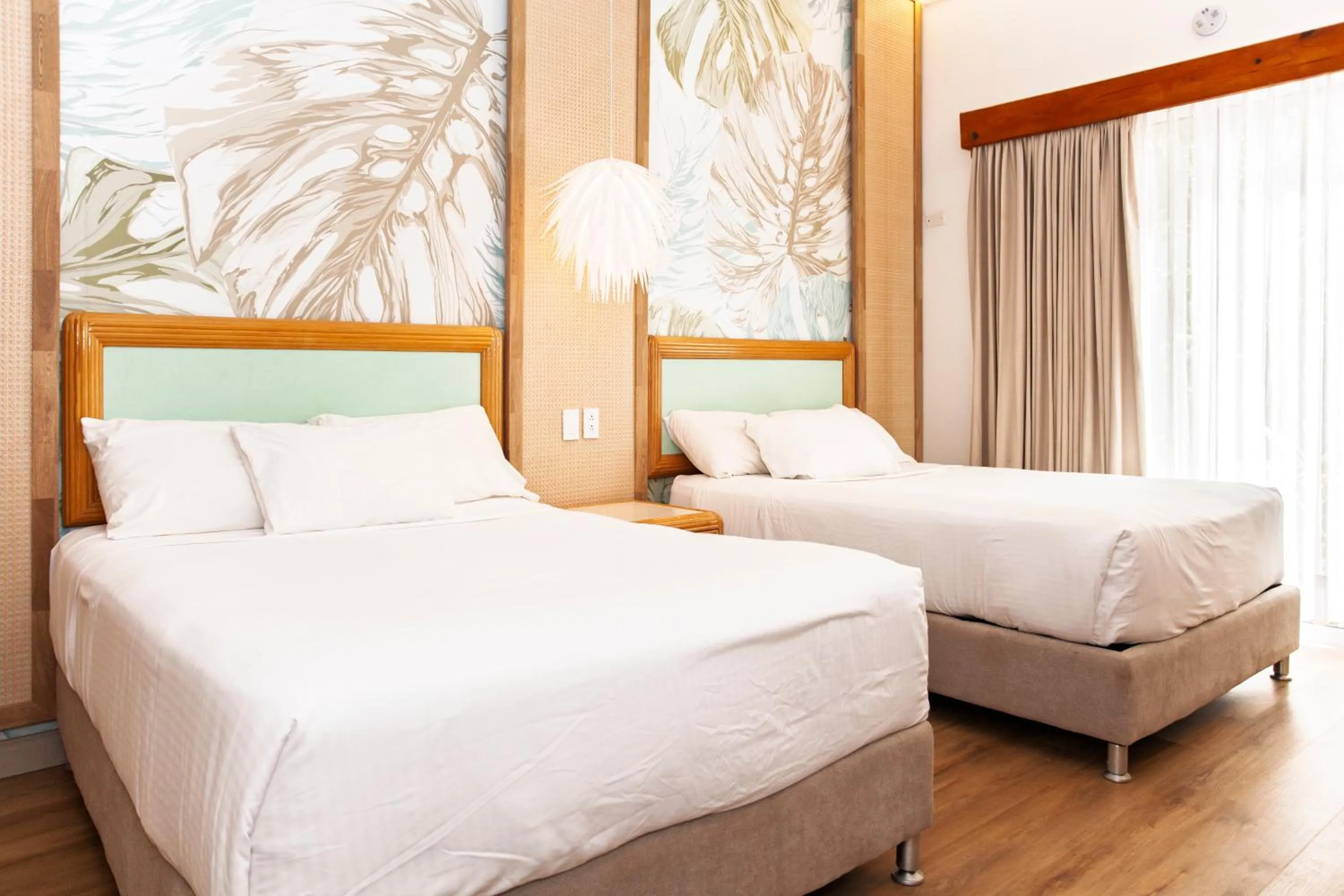 Bed in Hotel Cocoplum Beach