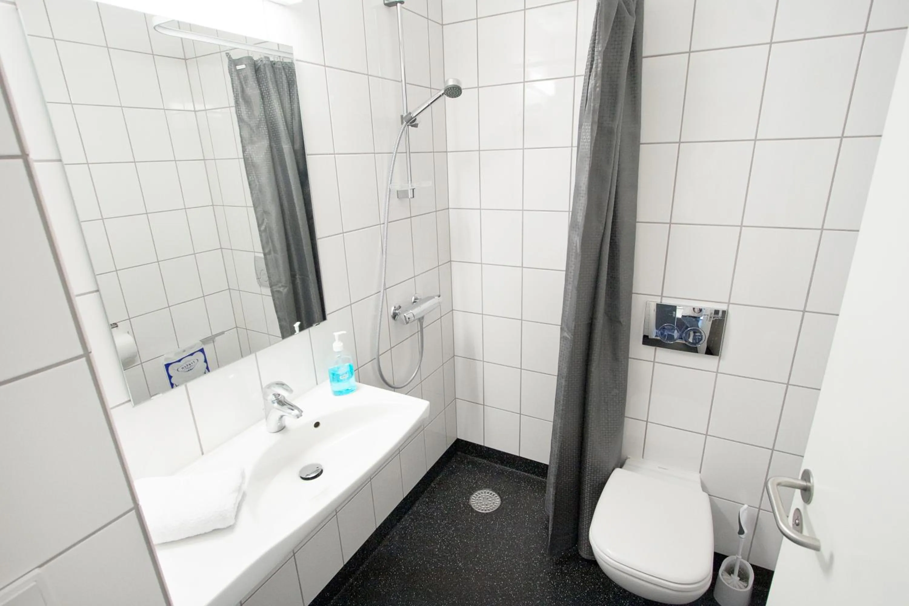 Shower in ApartHotel Faber