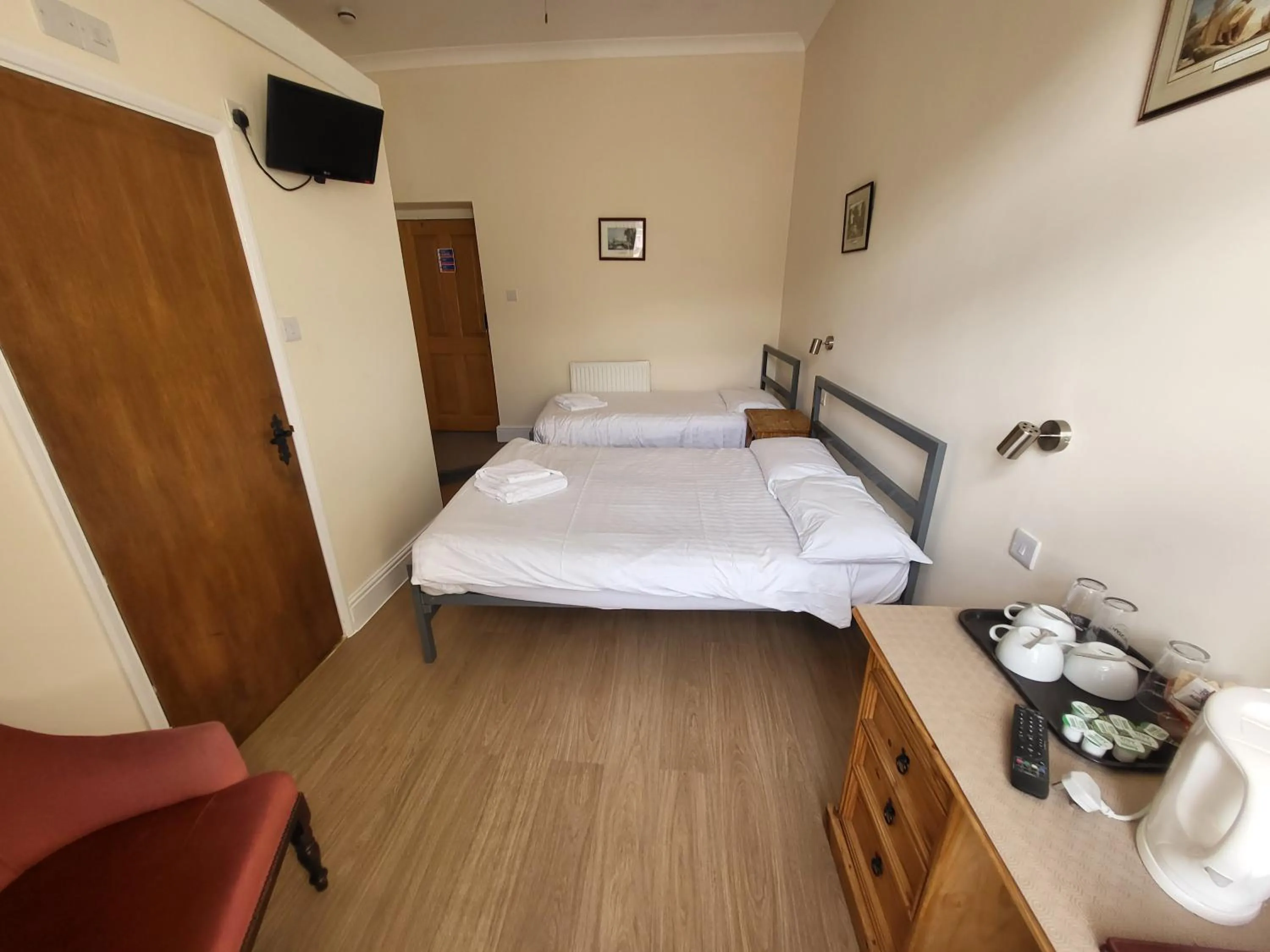 Bed in Royal Britannia Hotel