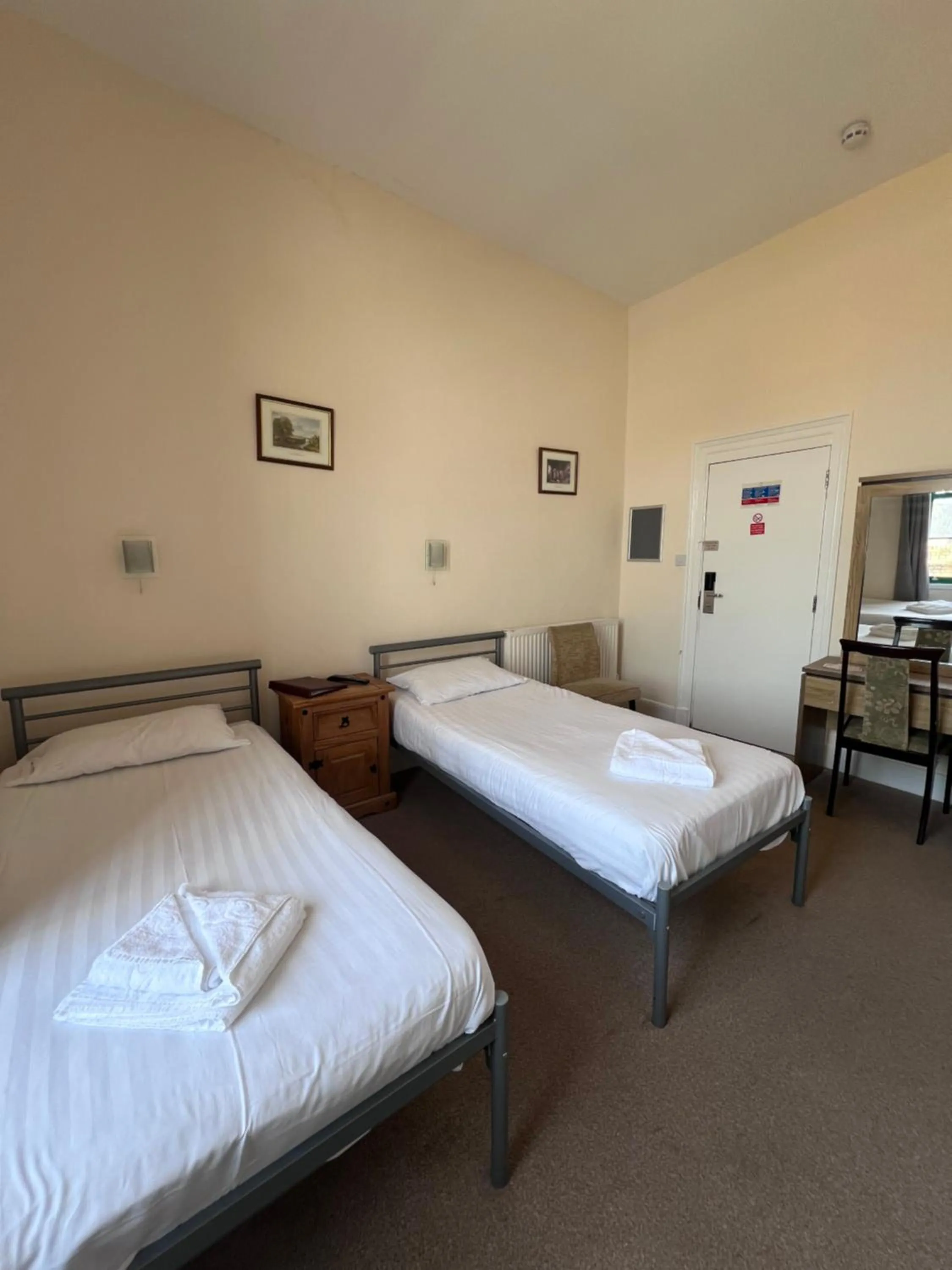 Bed in Royal Britannia Hotel