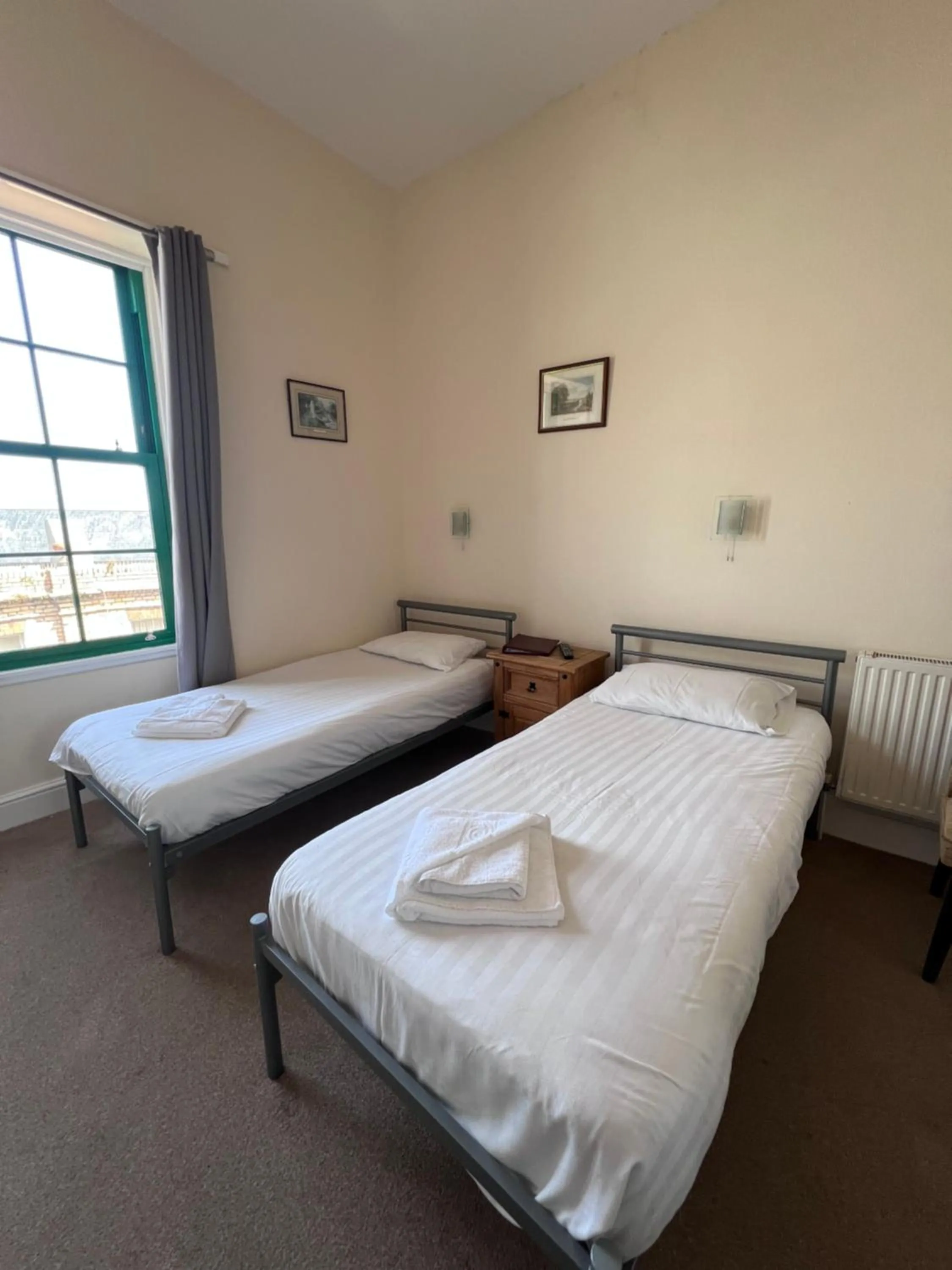 Bed in Royal Britannia Hotel