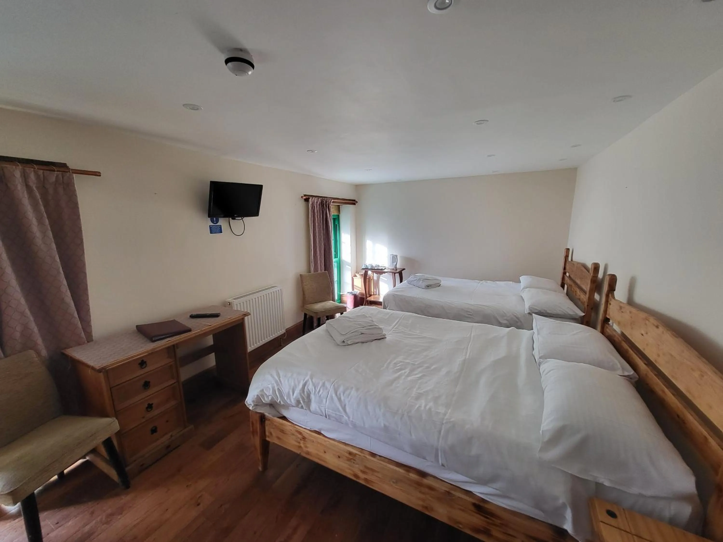 Bed in Royal Britannia Hotel