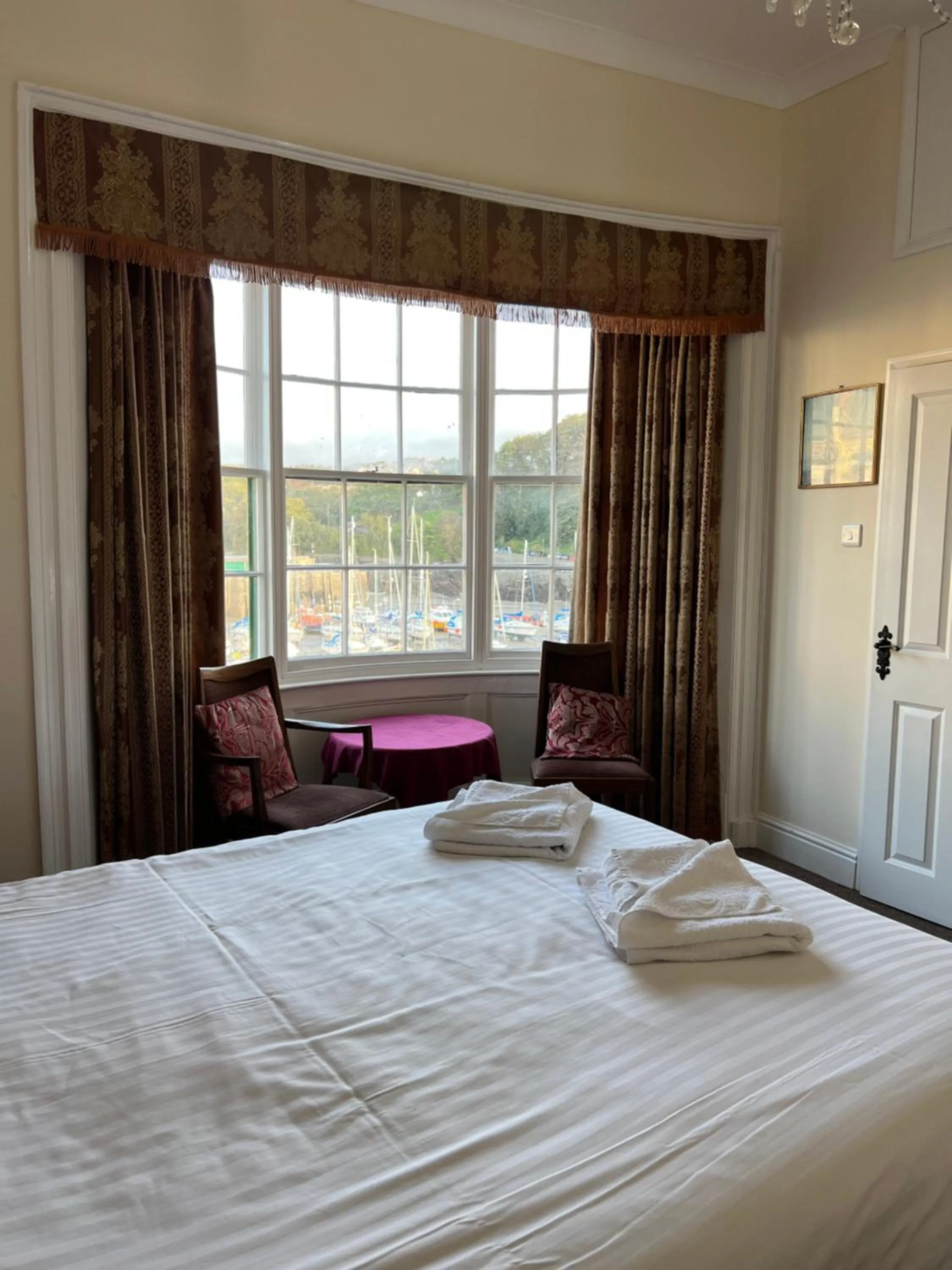 Bed in Royal Britannia Hotel