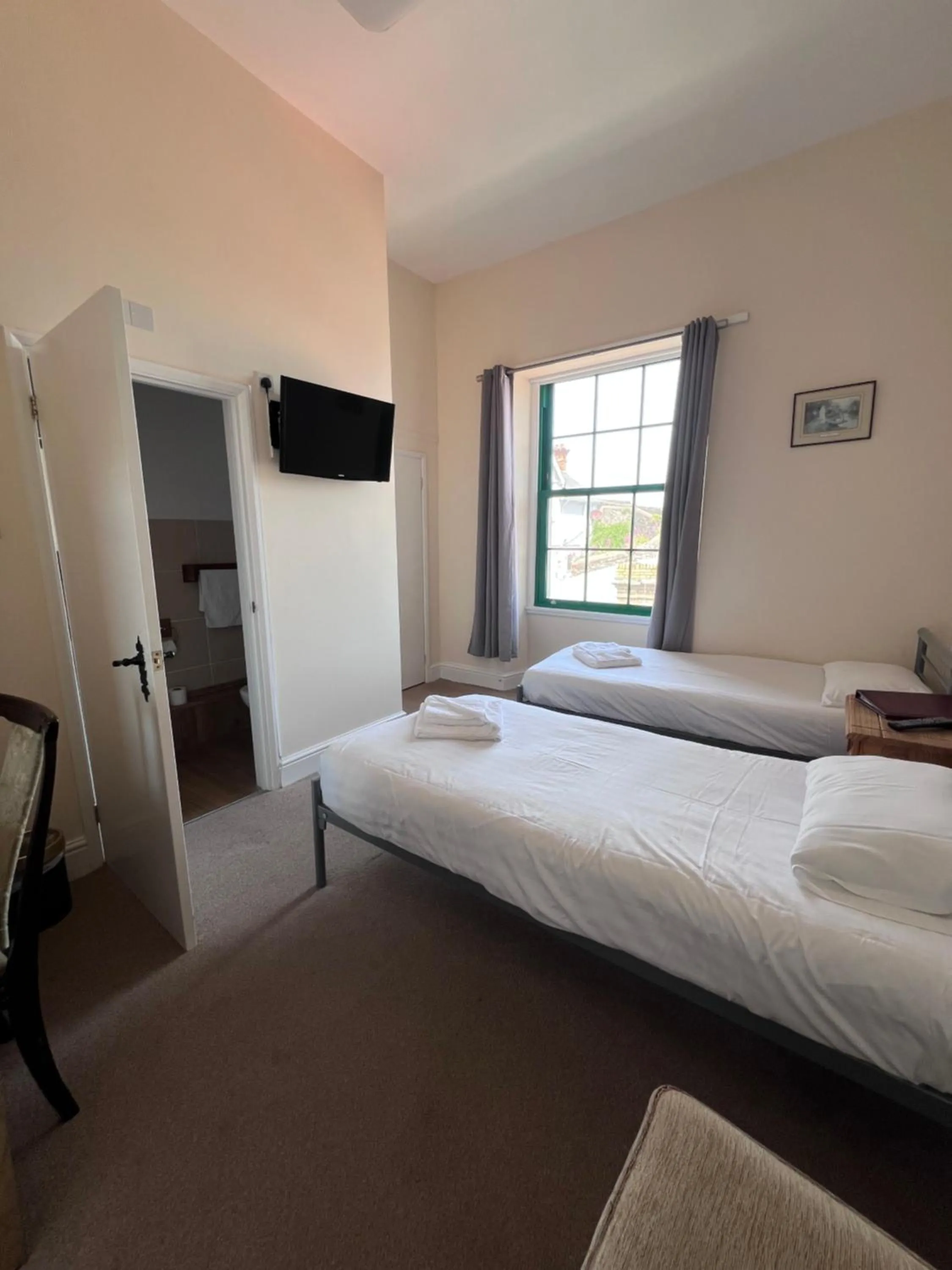 Bed in Royal Britannia Hotel