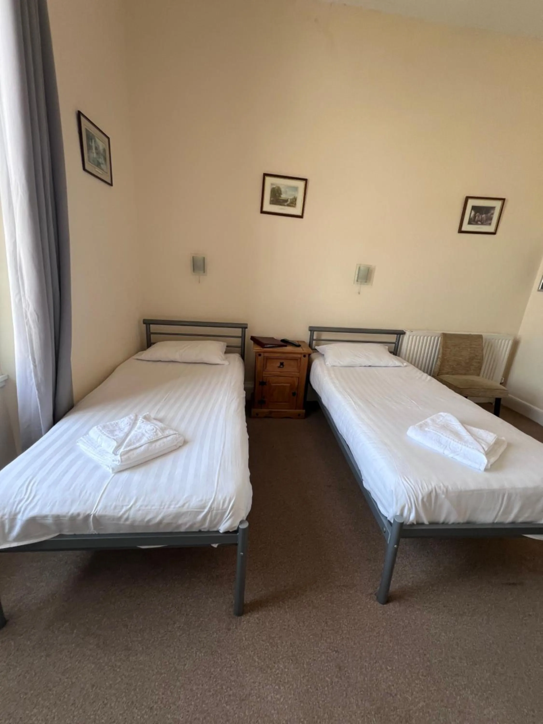 Bed in Royal Britannia Hotel