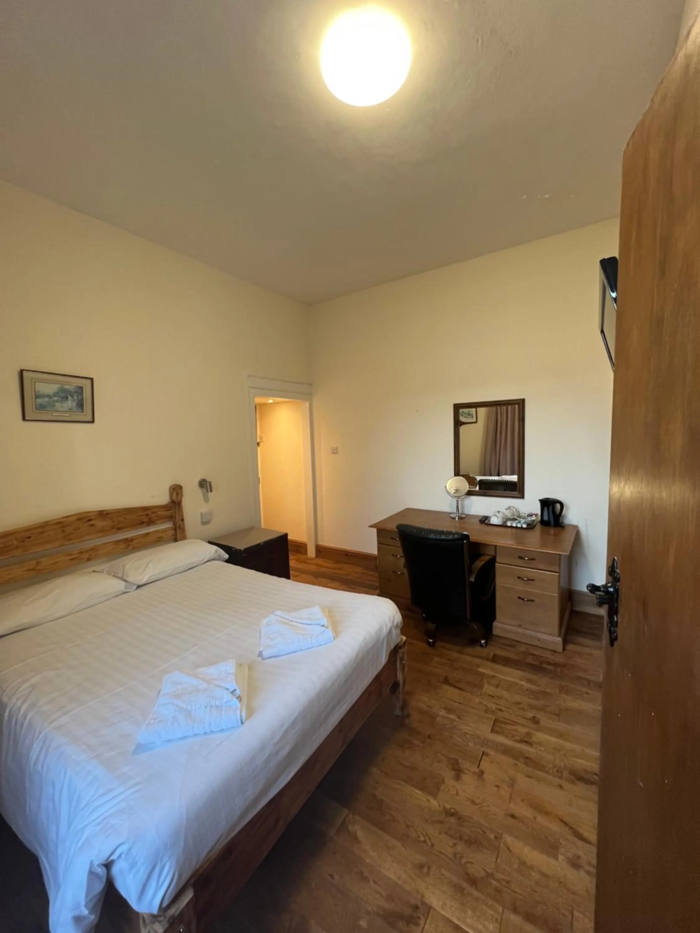 Bed in Royal Britannia Hotel