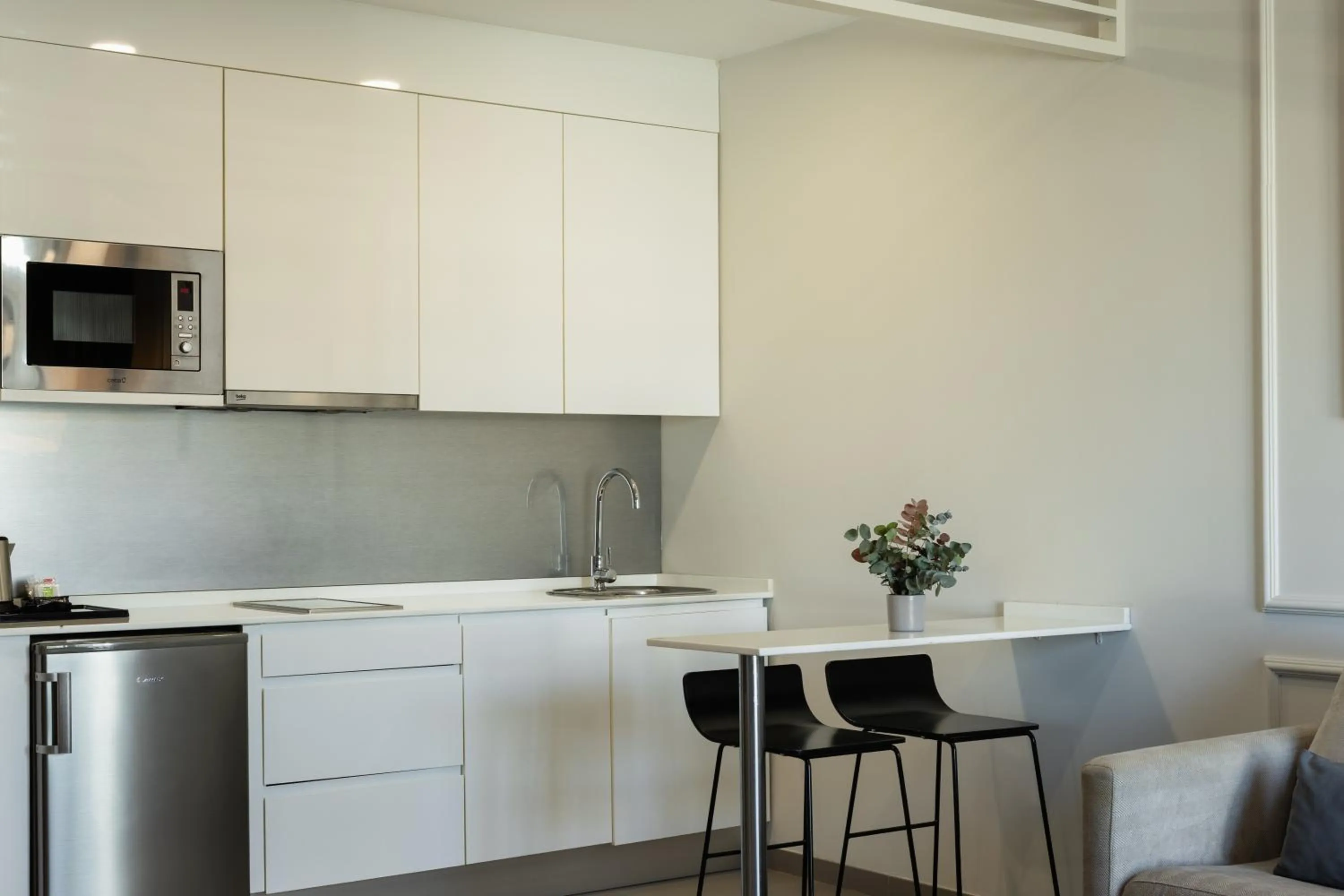 Kitchen or kitchenette in Sevilla Green Suites