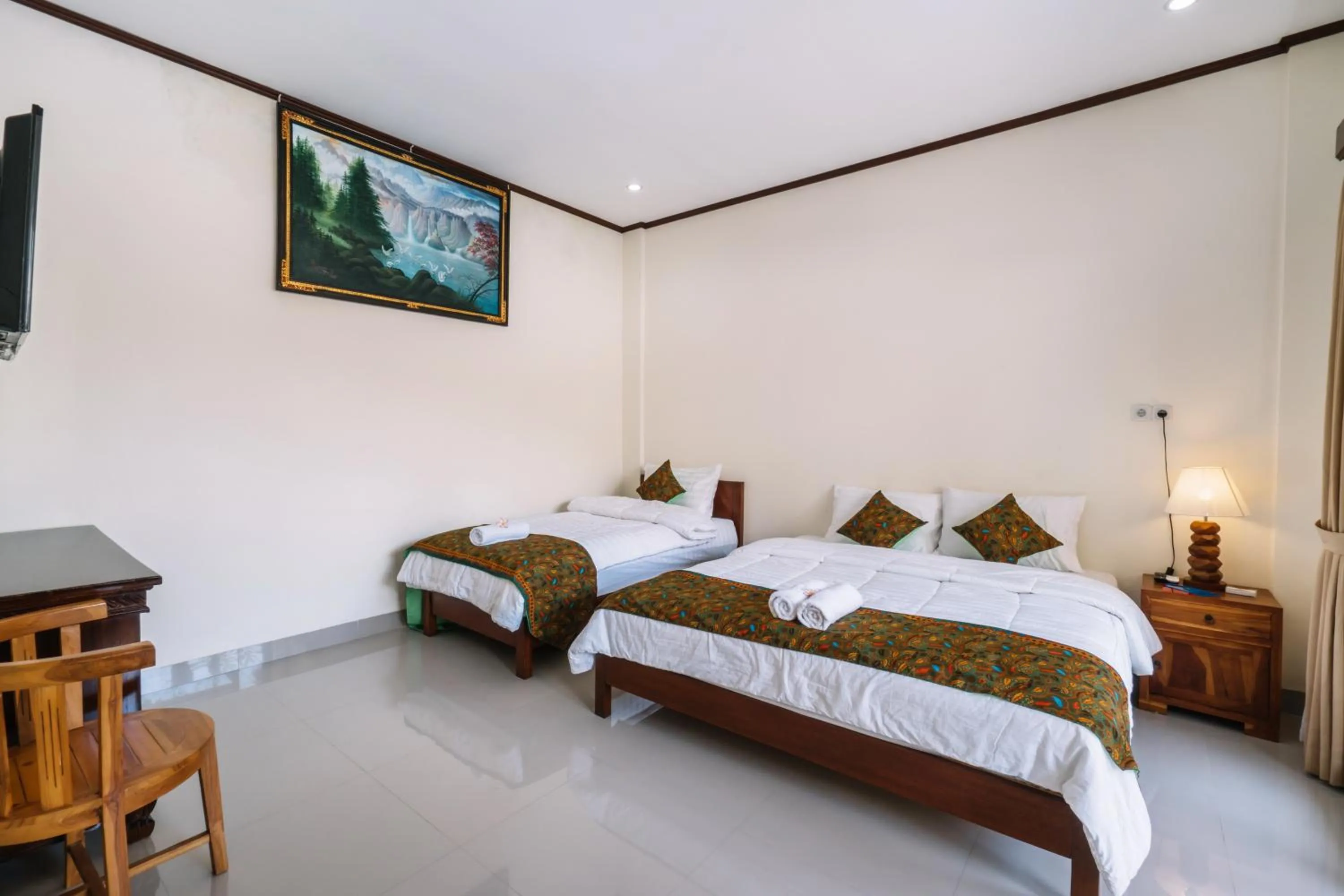 Bed in Sari Nusa Inn