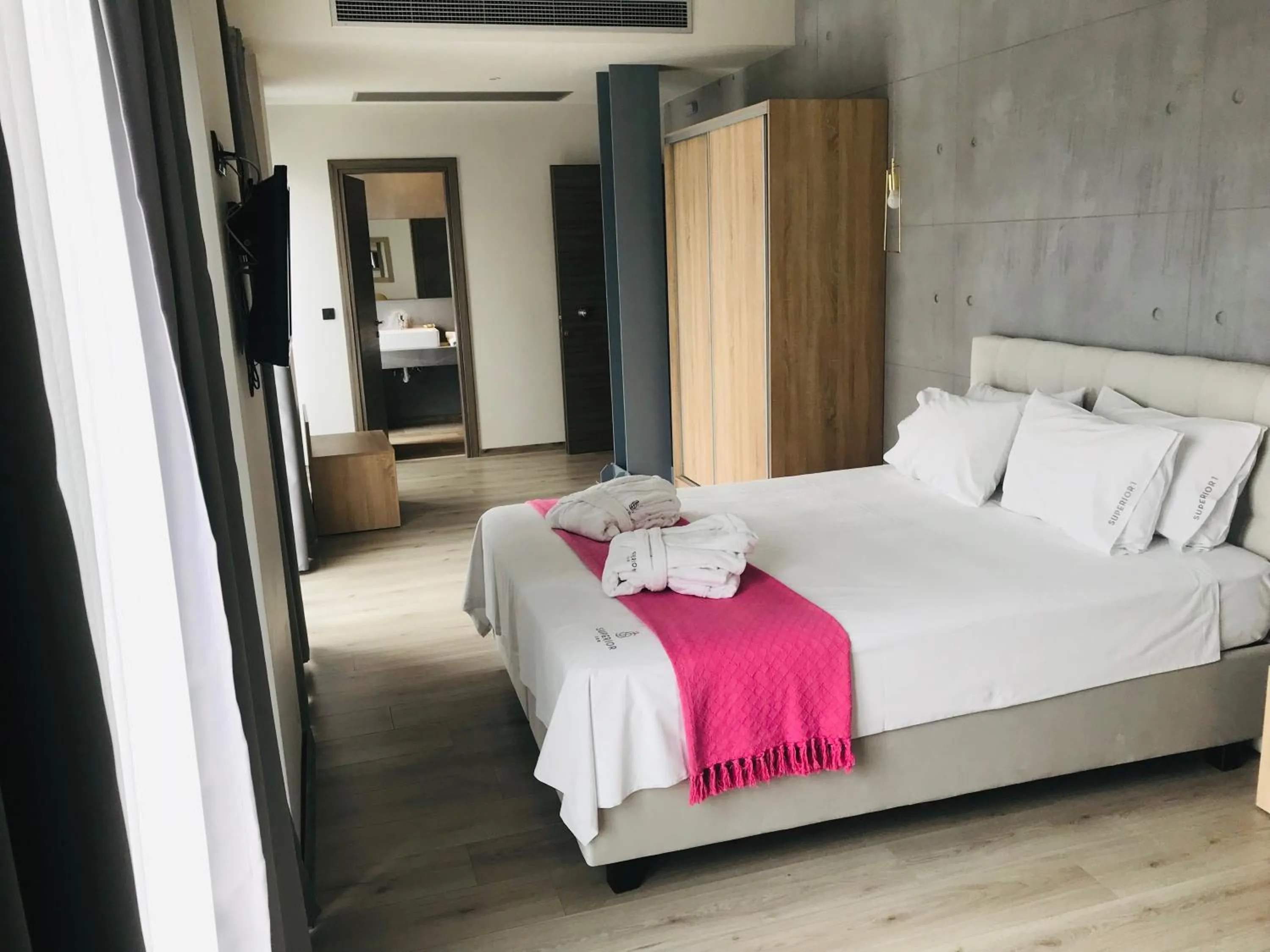 Bed in Superior One Boutique Hotel