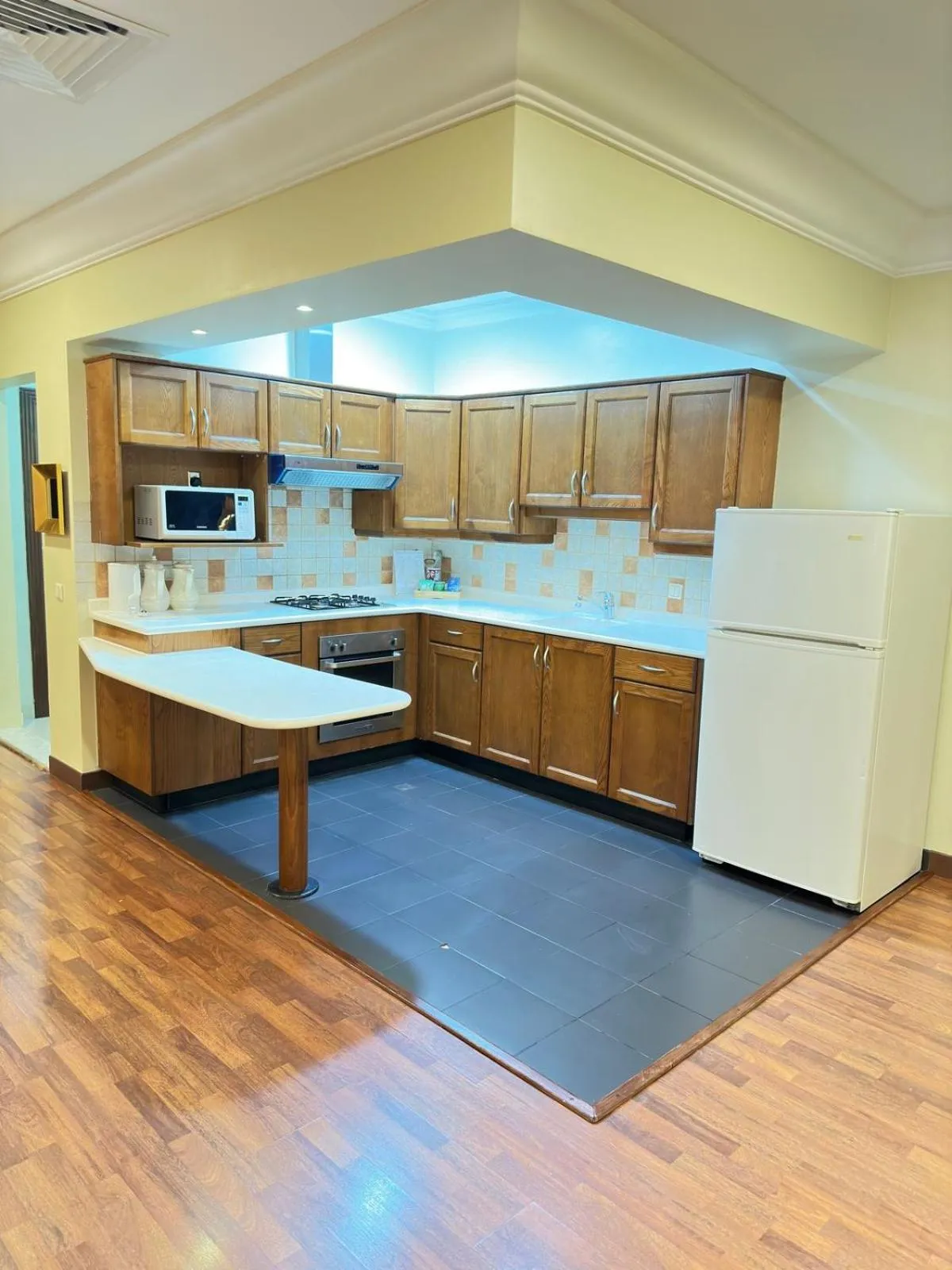 Kitchen or kitchenette in The Palace Suites