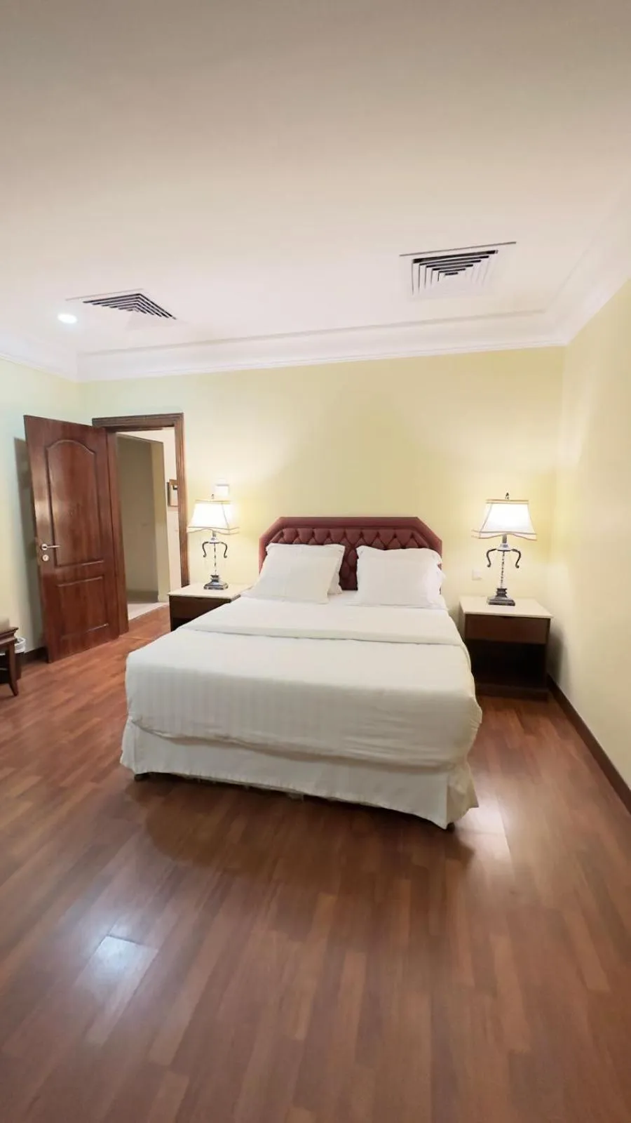 Bed in The Palace Suites