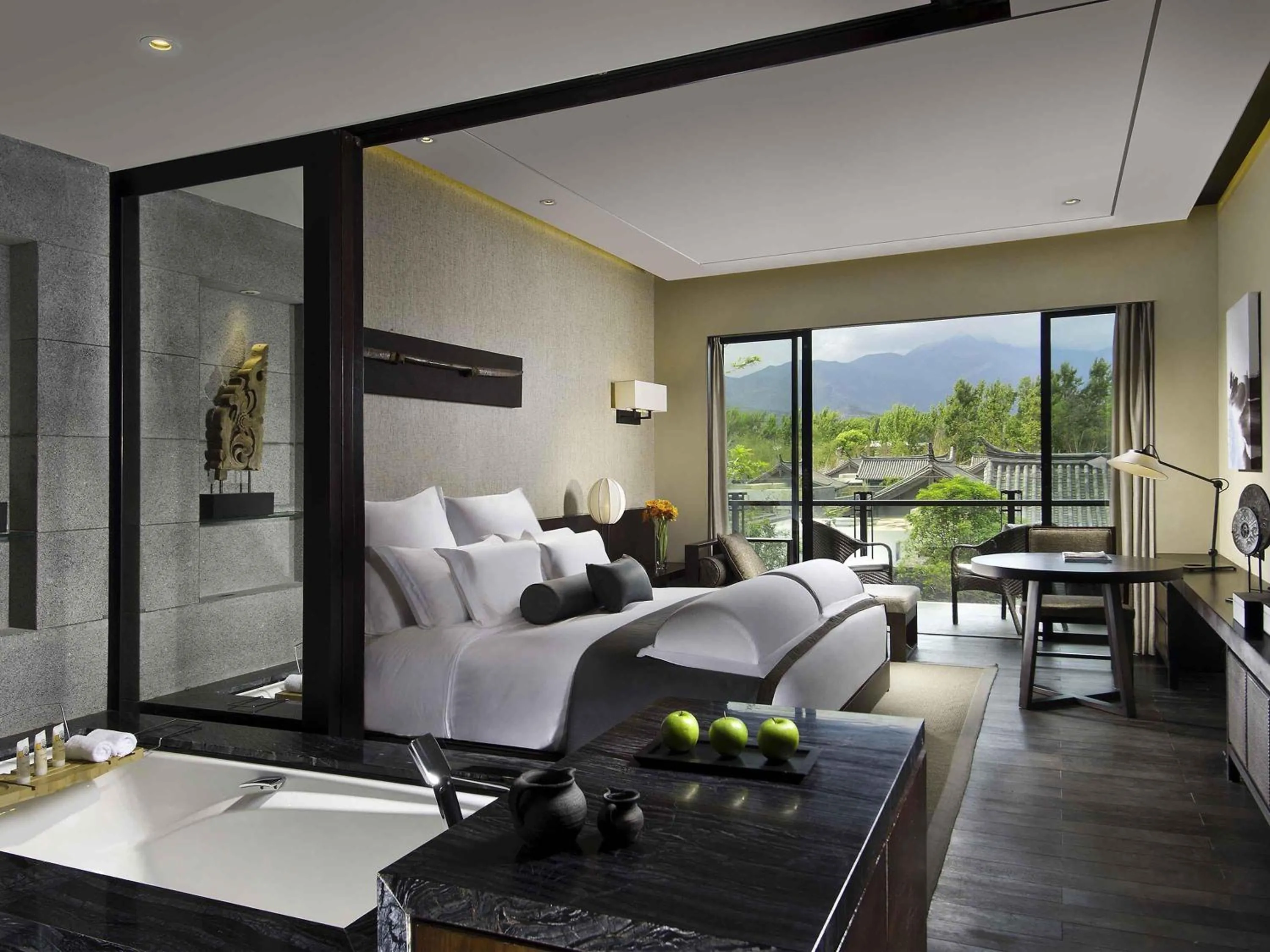Bedroom in Pullman Lijiang Resort &amp; Spa