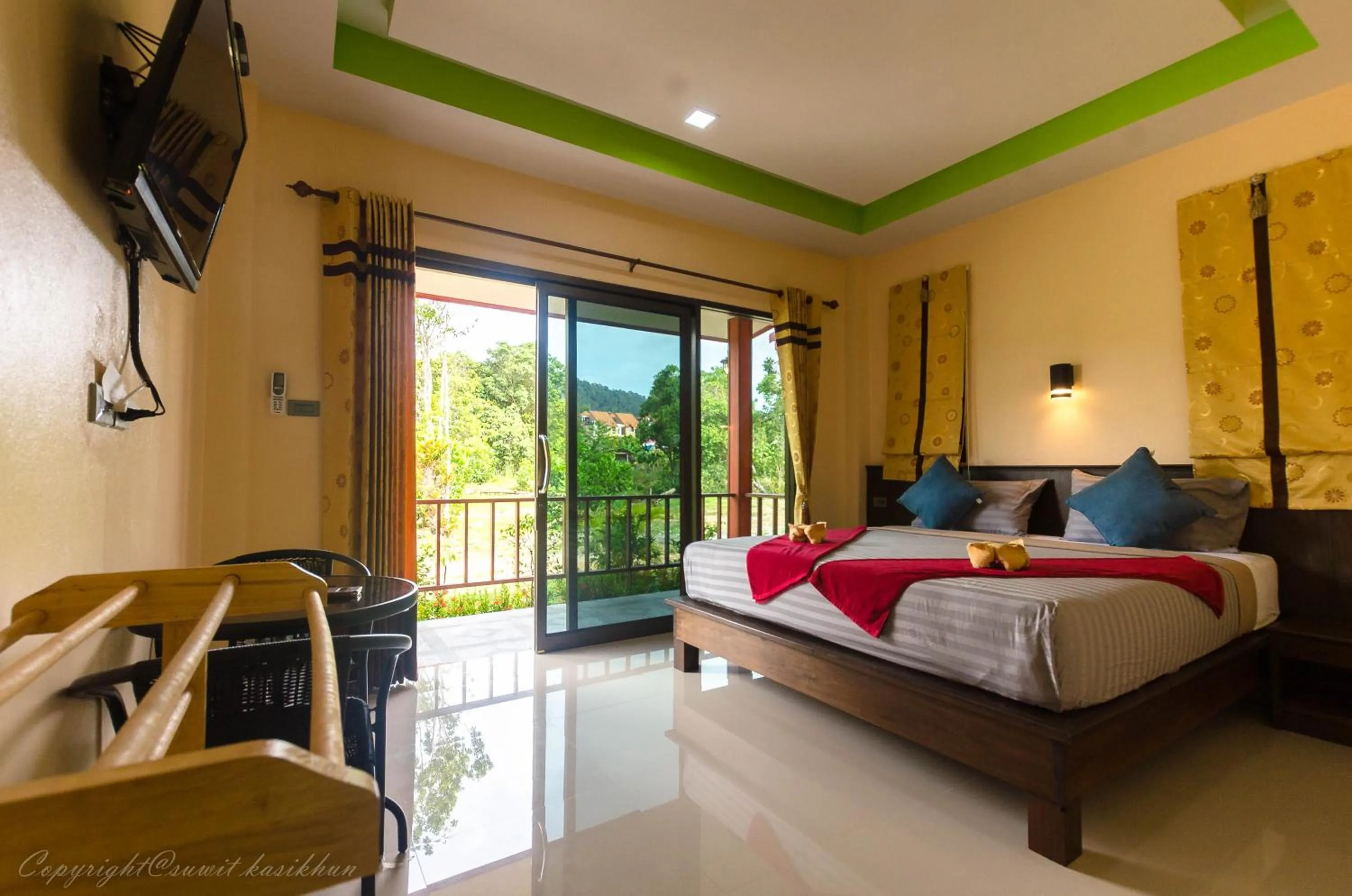 Photo of the whole room, Bed in Toongyoong Longbeach Resort SHA Plus